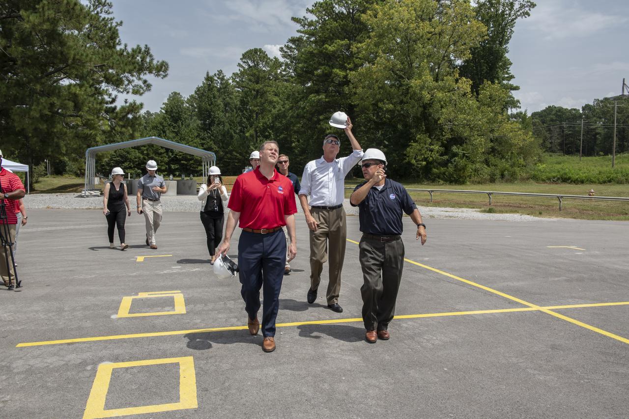 On August 15, 2018 NASA Administrator Jim Bridenstine visited Marshall Space Flight Center. Upon his arrival he was greeted by MSFC Acting Director Jody Singer along with the senior management team. From atop Marshall’s Test Stand 4693, NASA Administrator Jim Bridenstine and SLS Stages Integration Manager Tim Flores discuss the capabilities of Marshall’s newest test stand. The qualification test version of the liquid hydrogen tank for the Space Launch System’s core stage will be positioned between the stand’s 221-foot-tall twin towers where it will be pushed, pulled and subjected to the stresses it will endure during liftoff and flight.