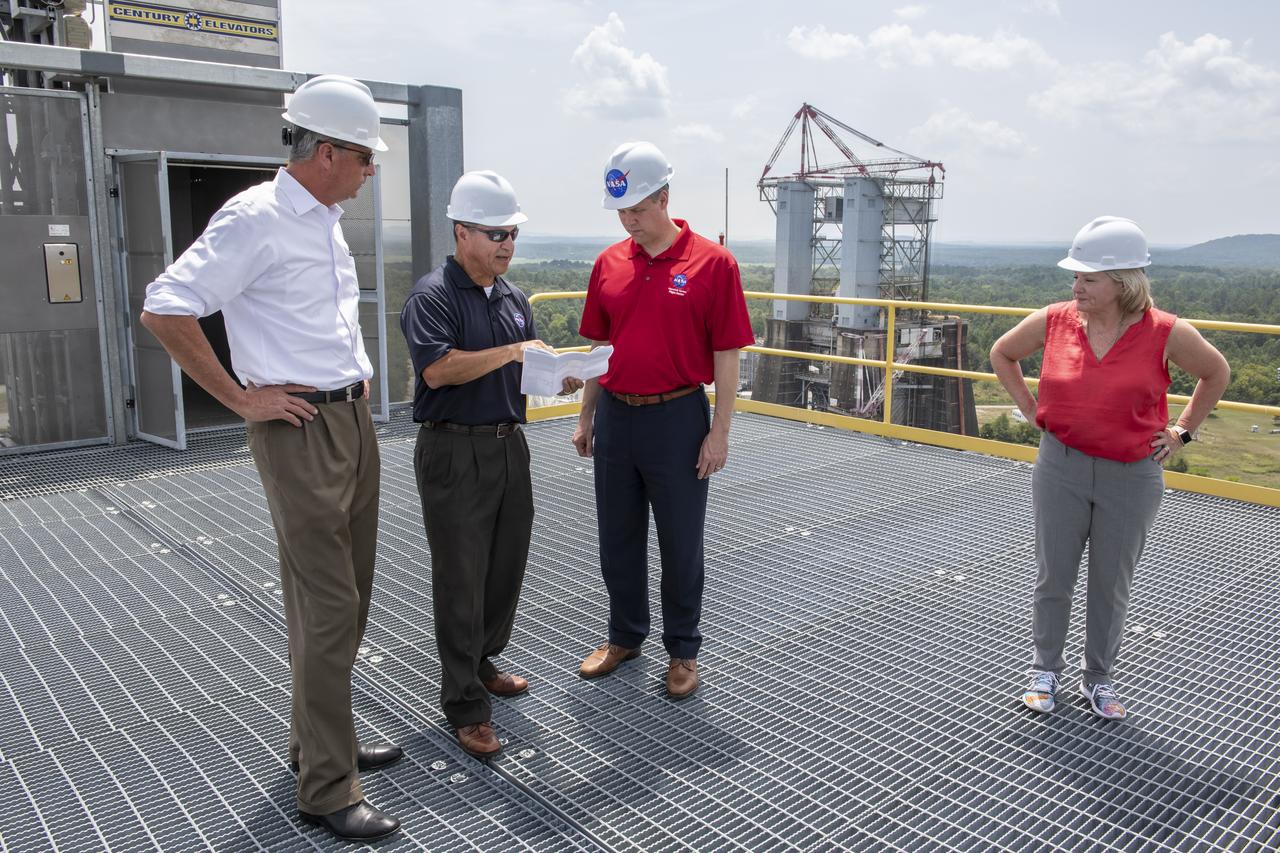 On August 15, 2018 NASA Administrator Jim Bridenstine visited Marshall Space Flight Center. Upon his arrival he was greeted by MSFC Acting Director Jody Singer along with the senior management team. From atop Marshall’s Test Stand 4693, NASA Administrator Jim Bridenstine and SLS Stages Integration Manager Tim Flores discuss the capabilities of Marshall’s newest test stand. The qualification test version of the liquid hydrogen tank for the Space Launch System’s core stage will be positioned between the stand’s 221-foot-tall twin towers where it will be pushed, pulled and subjected to the stresses it will endure during liftoff and flight.