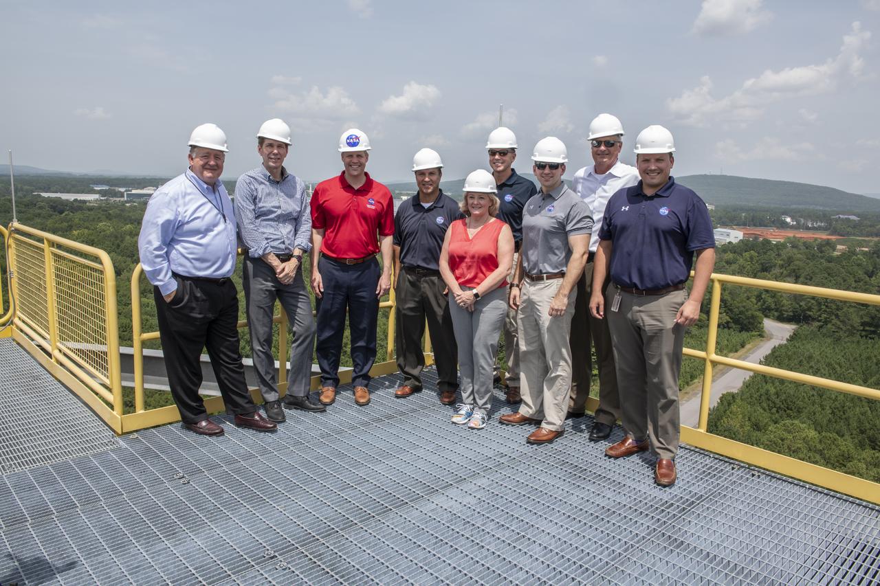 On August 15, 2018 NASA Administrator Jim Bridenstine visited Marshall Space Flight Center. Upon his arrival he was greeted by MSFC Acting Director Jody Singer along with the senior management team. From atop Marshallâ€™s Test Stand 4693, NASA Administrator Jim Bridenstine and SLS Stages Integration Manager Tim Flores discuss the capabilities of Marshallâ€™s newest test stand. The qualification test version of the liquid hydrogen tank for the Space Launch Systemâ€™s core stage will be positioned between the standâ€™s 221-foot-tall twin towers where it will be pushed, pulled and subjected to the stresses it will endure during liftoff and flight.