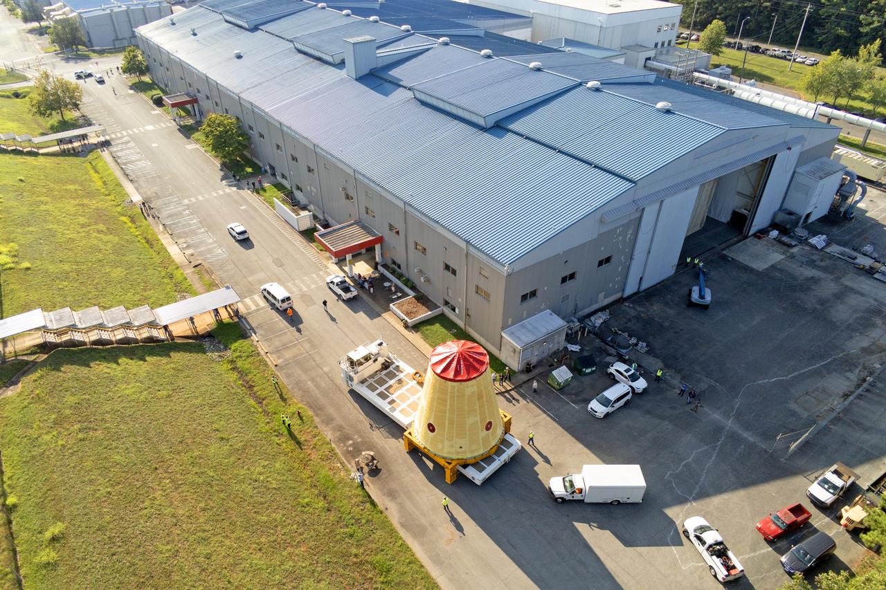 NASA rolled out a key piece of space flight hardware for the SLS (Space Launch System) rocket for the first crewed mission of NASA’s Artemis campaign from Marshall Space Flight Center in Huntsville, Alabama, on Wednesday, Aug. 21 for shipment to the agency’s spaceport in Florida. The cone-shaped launch vehicle stage adapter connects the rocket’s core stage to the upper stage and helps protect the upper stage’s engine that will help propel the Artemis II test flight around the Moon, slated for 2025. Manufactured by prime contractor Teledyne Brown Engineering and the Jacobs Space Exploration Group’s ESSCA (Engineering Services and Science Capability Augmentation) contract using NASA Marshall’s self-reacting friction-stir robotic and vertical weld tools. Crews moved the adapter out of NASA Marshall’s Building 4708 to the agency’s Pegasus barge Aug. 21. The barge will ferry the adapter first to NASA’s Michoud Assembly Facility in New Orleans, where crews will pick up additional SLS hardware for future Artemis missions, before traveling to NASA Kennedy. Once in Florida, the adapter will join the recently delivered core stage. There, teams with NASA’s Exploration Ground Systems will prepare the adapter for stacking and launch.