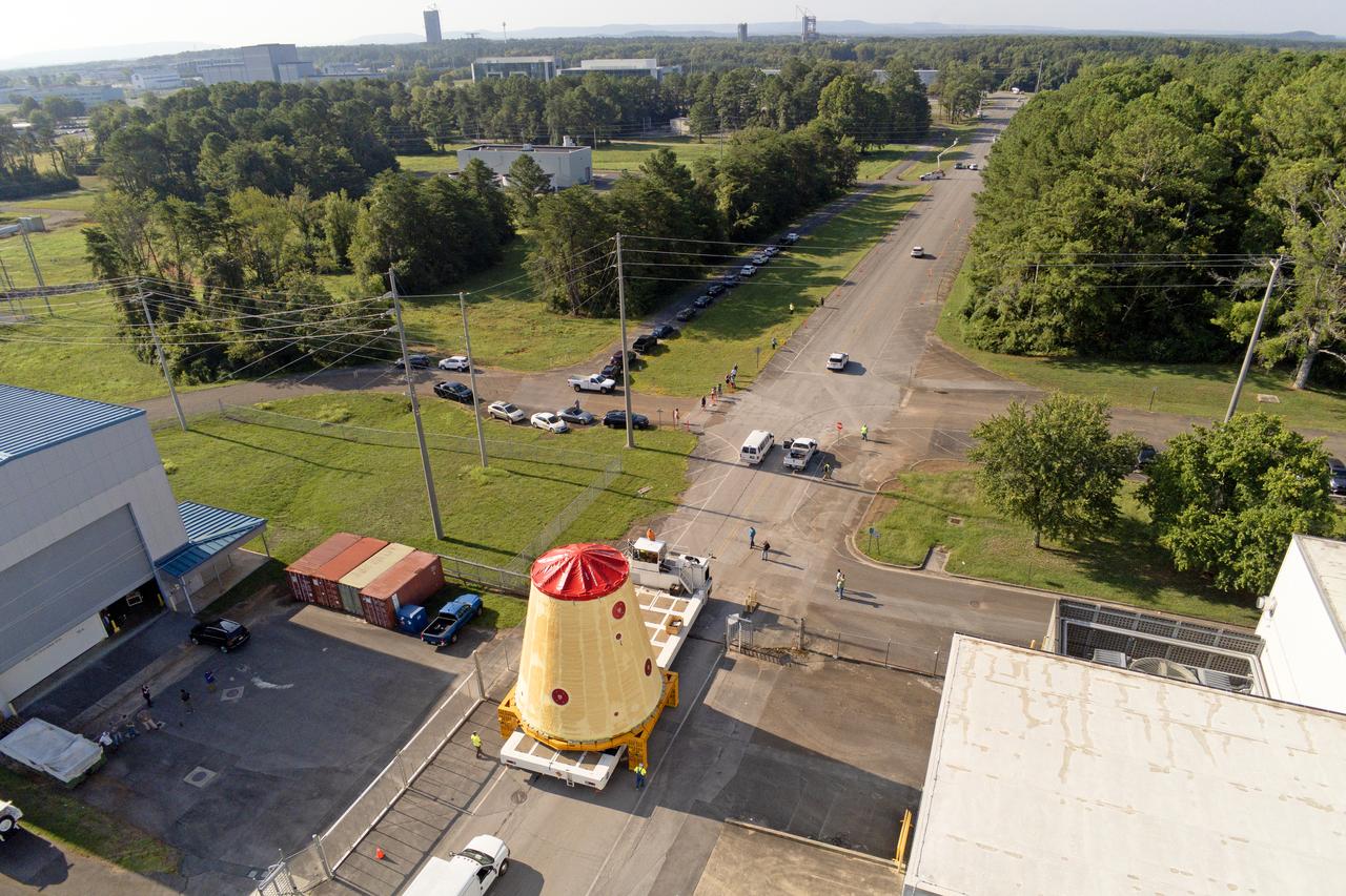 NASA rolled out a key piece of space flight hardware for the SLS (Space Launch System) rocket for the first crewed mission of NASA’s Artemis campaign from Marshall Space Flight Center in Huntsville, Alabama, on Wednesday, Aug. 21 for shipment to the agency’s spaceport in Florida. The cone-shaped launch vehicle stage adapter connects the rocket’s core stage to the upper stage and helps protect the upper stage’s engine that will help propel the Artemis II test flight around the Moon, slated for 2025. Manufactured by prime contractor Teledyne Brown Engineering and the Jacobs Space Exploration Group’s ESSCA (Engineering Services and Science Capability Augmentation) contract using NASA Marshall’s self-reacting friction-stir robotic and vertical weld tools. Crews moved the adapter out of NASA Marshall’s Building 4708 to the agency’s Pegasus barge Aug. 21. The barge will ferry the adapter first to NASA’s Michoud Assembly Facility in New Orleans, where crews will pick up additional SLS hardware for future Artemis missions, before traveling to NASA Kennedy. Once in Florida, the adapter will join the recently delivered core stage. There, teams with NASA’s Exploration Ground Systems will prepare the adapter for stacking and launch.