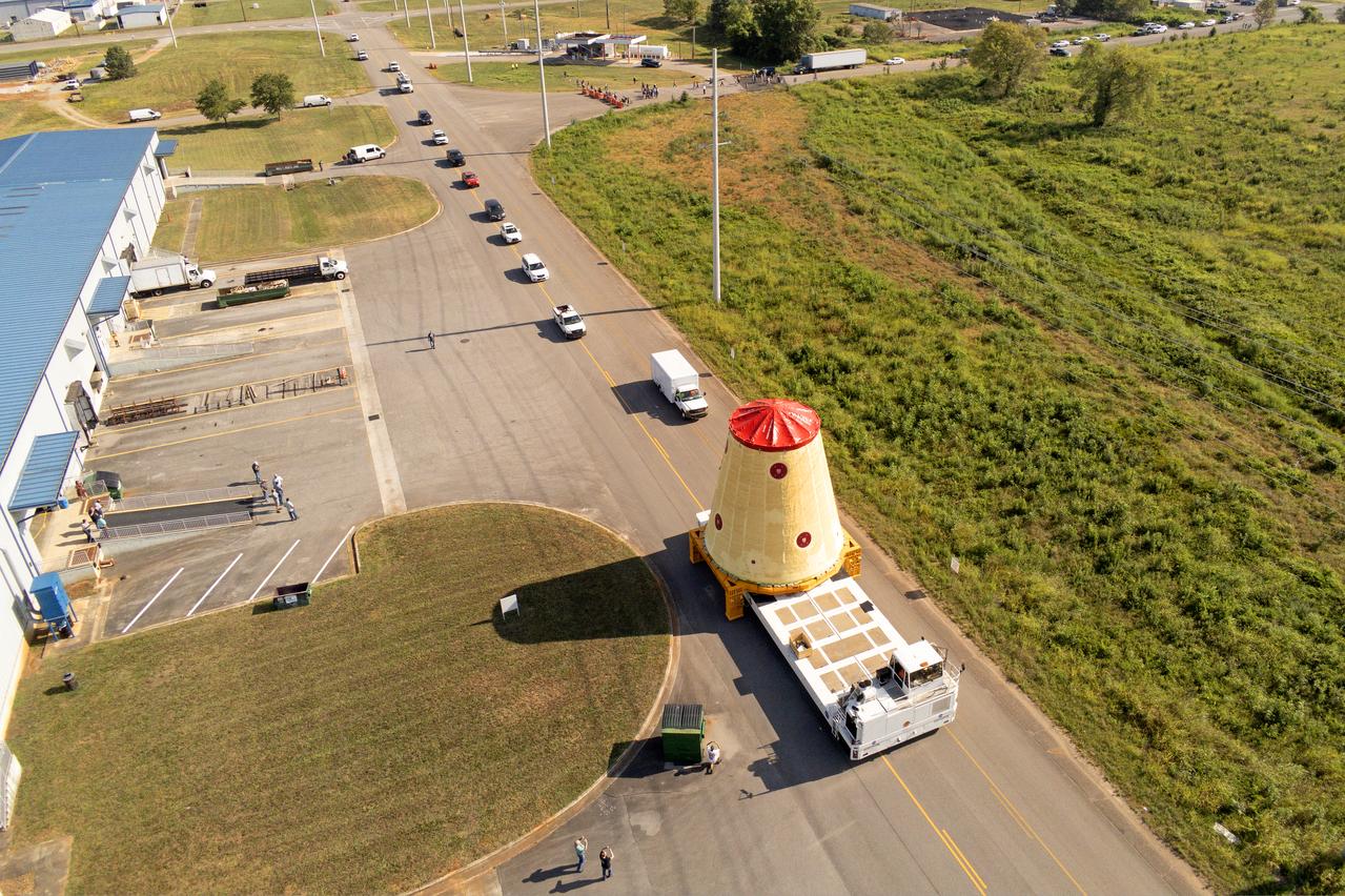NASA rolled out a key piece of space flight hardware for the SLS (Space Launch System) rocket for the first crewed mission of NASA’s Artemis campaign from Marshall Space Flight Center in Huntsville, Alabama, on Wednesday, Aug. 21 for shipment to the agency’s spaceport in Florida. The cone-shaped launch vehicle stage adapter connects the rocket’s core stage to the upper stage and helps protect the upper stage’s engine that will help propel the Artemis II test flight around the Moon, slated for 2025. Manufactured by prime contractor Teledyne Brown Engineering and the Jacobs Space Exploration Group’s ESSCA (Engineering Services and Science Capability Augmentation) contract using NASA Marshall’s self-reacting friction-stir robotic and vertical weld tools. Crews moved the adapter out of NASA Marshall’s Building 4708 to the agency’s Pegasus barge Aug. 21. The barge will ferry the adapter first to NASA’s Michoud Assembly Facility in New Orleans, where crews will pick up additional SLS hardware for future Artemis missions, before traveling to NASA Kennedy. Once in Florida, the adapter will join the recently delivered core stage. There, teams with NASA’s Exploration Ground Systems will prepare the adapter for stacking and launch.