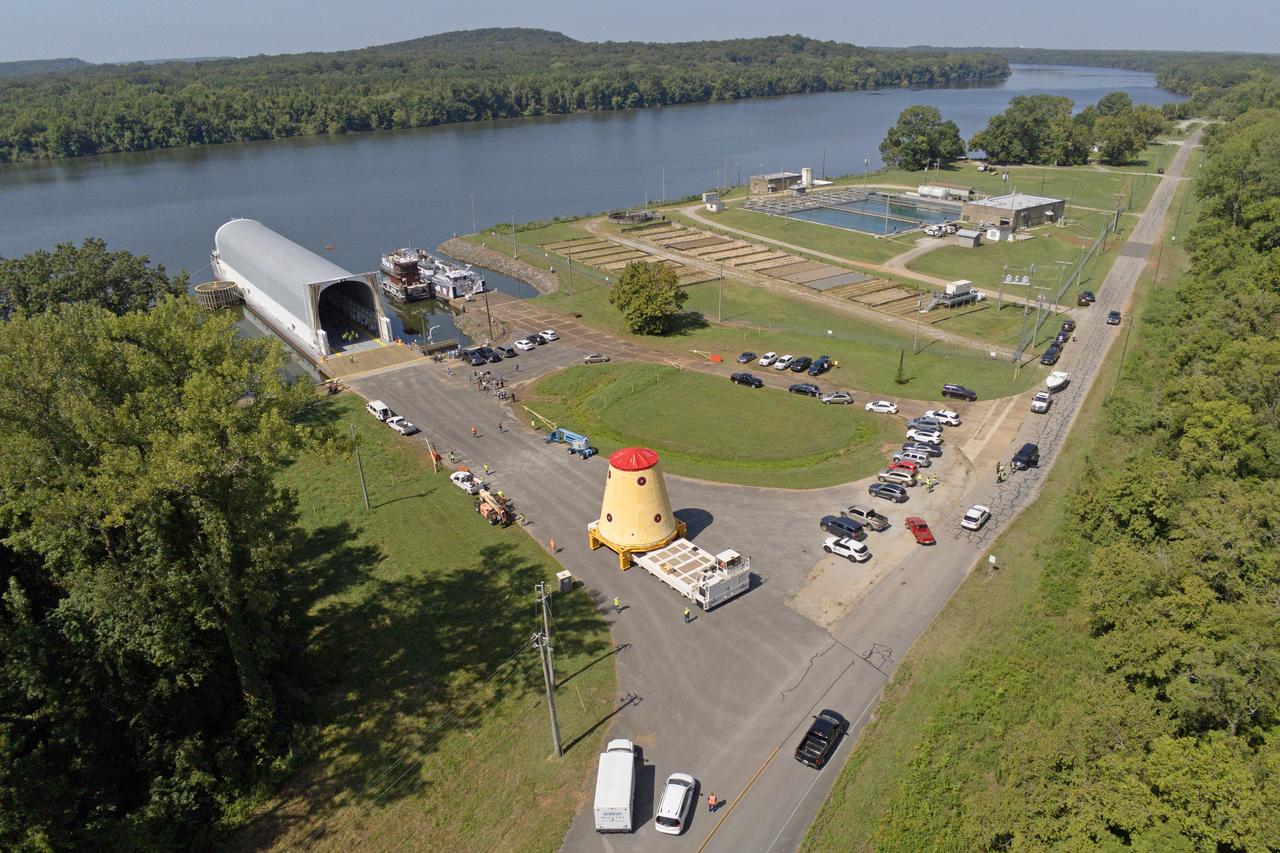 NASA rolled out a key piece of space flight hardware for the SLS (Space Launch System) rocket for the first crewed mission of NASA’s Artemis campaign from Marshall Space Flight Center in Huntsville, Alabama, on Wednesday, Aug. 21 for shipment to the agency’s spaceport in Florida. The cone-shaped launch vehicle stage adapter connects the rocket’s core stage to the upper stage and helps protect the upper stage’s engine that will help propel the Artemis II test flight around the Moon, slated for 2025. Manufactured by prime contractor Teledyne Brown Engineering and the Jacobs Space Exploration Group’s ESSCA (Engineering Services and Science Capability Augmentation) contract using NASA Marshall’s self-reacting friction-stir robotic and vertical weld tools. Crews moved the adapter out of NASA Marshall’s Building 4708 to the agency’s Pegasus barge Aug. 21. The barge will ferry the adapter first to NASA’s Michoud Assembly Facility in New Orleans, where crews will pick up additional SLS hardware for future Artemis missions, before traveling to NASA Kennedy. Once in Florida, the adapter will join the recently delivered core stage. There, teams with NASA’s Exploration Ground Systems will prepare the adapter for stacking and launch.