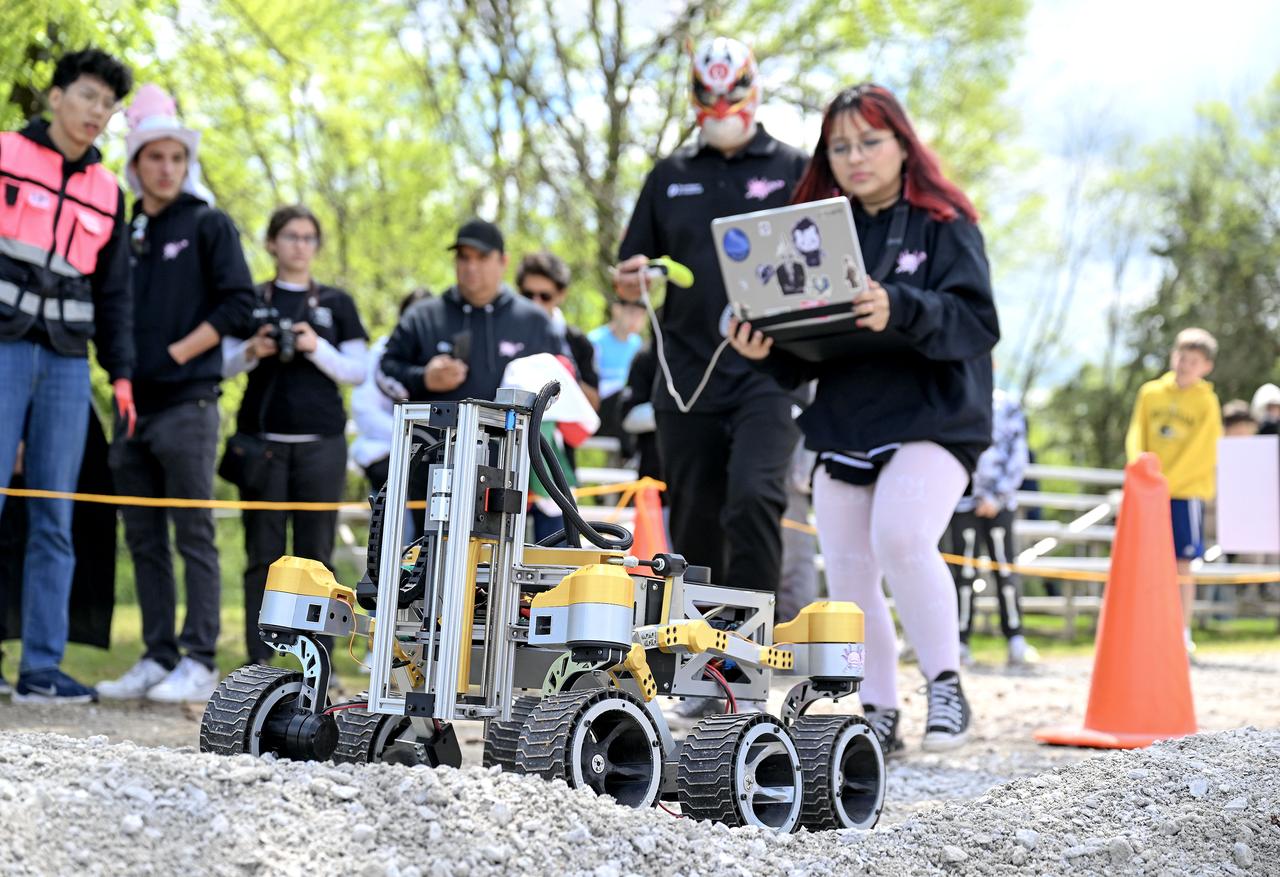 More than 500 students with 75 teams from around the world participated in the 31st year of NASA’s Human Exploration Rover Challenge (HERC) on April 11 and April 12, 2025, near NASA’s Marshall Space Flight Center in Huntsville, Alabama. Participating teams represented 35 colleges and universities, 38 high schools, and two middle schools from 20 states, Puerto Rico, and 16 other nations. NASA expanded the 2025 challenge to include a remote-control division - named Remote-Operated Vehicular Research - and invited middle school students to participate. Teams were awarded points based on navigating a half-mile obstacle course, conducting mission-specific task challenges, and completing multiple safety and design reviews with NASA engineers. 