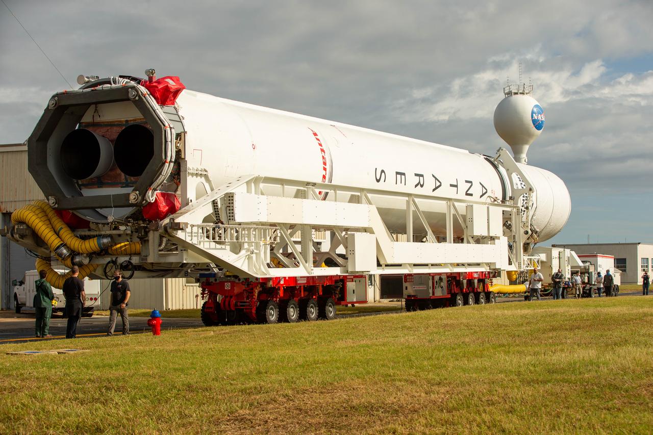A Northrop Grumman Antares rocket carrying a Cygnus resupply spacecraft is seen as it is rolled out of the Horizontal Integration Facility to the Mid-Atlantic Regional Spaceport’s Pad-0A, Saturday, September 26, 2020, at NASA's Wallops Flight Facility in Virginia. Northrop Grumman’s 14th contracted cargo resupply mission with NASA to the International Space Station will deliver about 8,000 pounds of science and research, crew supplies and vehicle hardware to the orbital laboratory and its crew. The CRS-14 Cygnus spacecraft is named after the first female astronaut of Indian descent, Kaplana Chawla, and is scheduled to launch at 10:27 p.m., Tuesday, September 29, 2020 EDT. Photo Credit: (NASA/Patrick Black) 