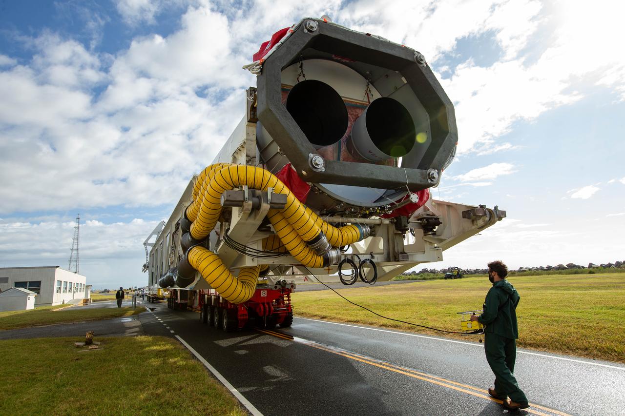 A Northrop Grumman Antares rocket carrying a Cygnus resupply spacecraft is seen as it is rolled out of the Horizontal Integration Facility to the Mid-Atlantic Regional Spaceport’s Pad-0A, Saturday, September 26, 2020, at NASA's Wallops Flight Facility in Virginia. Northrop Grumman’s 14th contracted cargo resupply mission with NASA to the International Space Station will deliver about 8,000 pounds of science and research, crew supplies and vehicle hardware to the orbital laboratory and its crew. The CRS-14 Cygnus spacecraft is named after the first female astronaut of Indian descent, Kaplana Chawla, and is scheduled to launch at 10:27 p.m., Tuesday, September 29, 2020 EDT. Photo Credit: (NASA/Patrick Black) 
