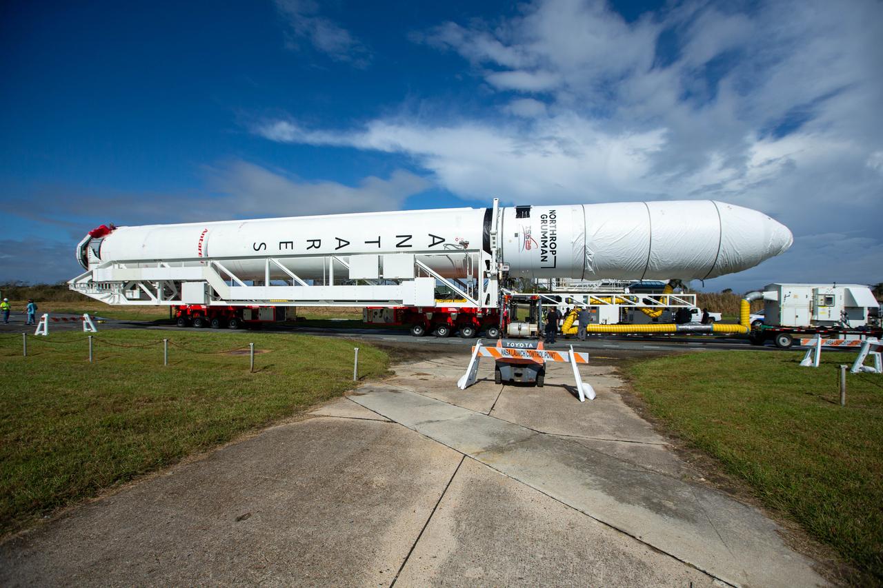 A Northrop Grumman Antares rocket carrying a Cygnus resupply spacecraft is seen as it is rolled out of the Horizontal Integration Facility to the Mid-Atlantic Regional Spaceport’s Pad-0A, Saturday, September 26, 2020, at NASA's Wallops Flight Facility in Virginia. Northrop Grumman’s 14th contracted cargo resupply mission with NASA to the International Space Station will deliver about 8,000 pounds of science and research, crew supplies and vehicle hardware to the orbital laboratory and its crew. The CRS-14 Cygnus spacecraft is named after the first female astronaut of Indian descent, Kaplana Chawla, and is scheduled to launch at 10:27 p.m., Tuesday, September 29, 2020 EDT. Photo Credit: (NASA/Patrick Black) 