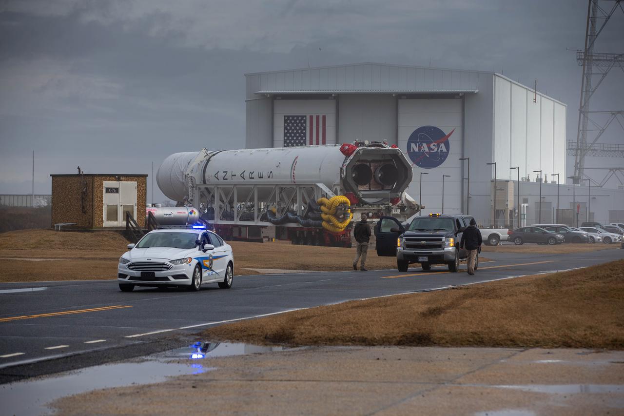A Northrop Grumman Antares rocket carrying a Cygnus resupply spacecraft is seen as it is transported to the Mid-Atlantic Regional Spaceport’s Pad-0A, Tuesday, Feb. 16, 2021, at NASA's Wallops Flight Facility in Virginia. Northrop Grumman’s 15th contracted cargo resupply mission with NASA to the International Space Station will deliver about 8,000 pounds of science and research, crew supplies and vehicle hardware to the orbital laboratory and its crew. The CRS-15 Cygnus spacecraft is named after NASA mathematician, Katherine Johnson, a Black woman who time and again broke through barriers of gender and race. The launch is scheduled for 12:36 p.m. EST, Feb. 20, 2021. Photo Credit: (NASA/Patrick Black)
