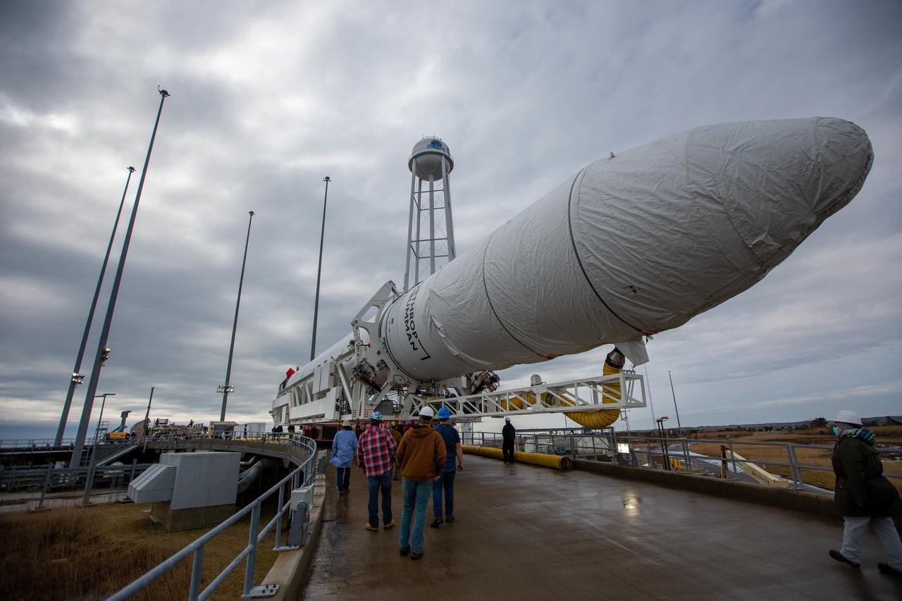 A Northrop Grumman Antares rocket carrying a Cygnus resupply spacecraft arrives at the Mid-Atlantic Regional Spaceport’s Pad-0A, Tuesday, Feb. 16, 2021, at NASA's Wallops Flight Facility in Virginia. Northrop Grumman’s 15th contracted cargo resupply mission with NASA to the International Space Station will deliver about 8,000 pounds of science and research, crew supplies and vehicle hardware to the orbital laboratory and its crew. The CRS-15 Cygnus spacecraft is named after NASA mathematician, Katherine Johnson, a Black woman who time and again broke through barriers of gender and race. The launch is scheduled for 12:36 p.m. EST, Feb. 20, 2021. Photo Credit: (NASA/Patrick Black)