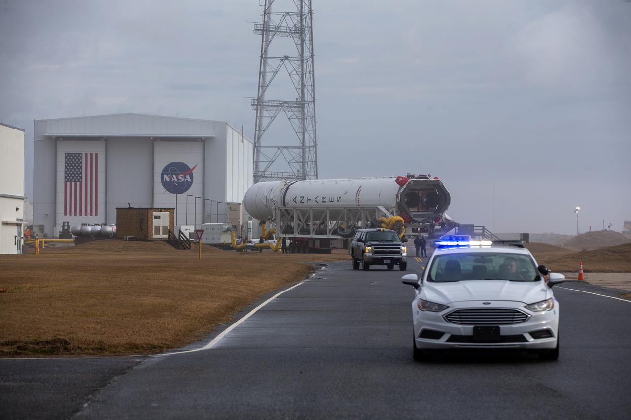 A Northrop Grumman Antares rocket carrying a Cygnus resupply spacecraft is seen as it is transported to the Mid-Atlantic Regional Spaceport’s Pad-0A, Tuesday, Feb. 16, 2021, at NASA's Wallops Flight Facility in Virginia. Northrop Grumman’s 15th contracted cargo resupply mission with NASA to the International Space Station will deliver about 8,000 pounds of science and research, crew supplies and vehicle hardware to the orbital laboratory and its crew. The CRS-15 Cygnus spacecraft is named after NASA mathematician, Katherine Johnson, a Black woman who time and again broke through barriers of gender and race. The launch is scheduled for 12:36 p.m. EST, Feb. 20, 2021. Photo Credit: (NASA/Patrick Black)