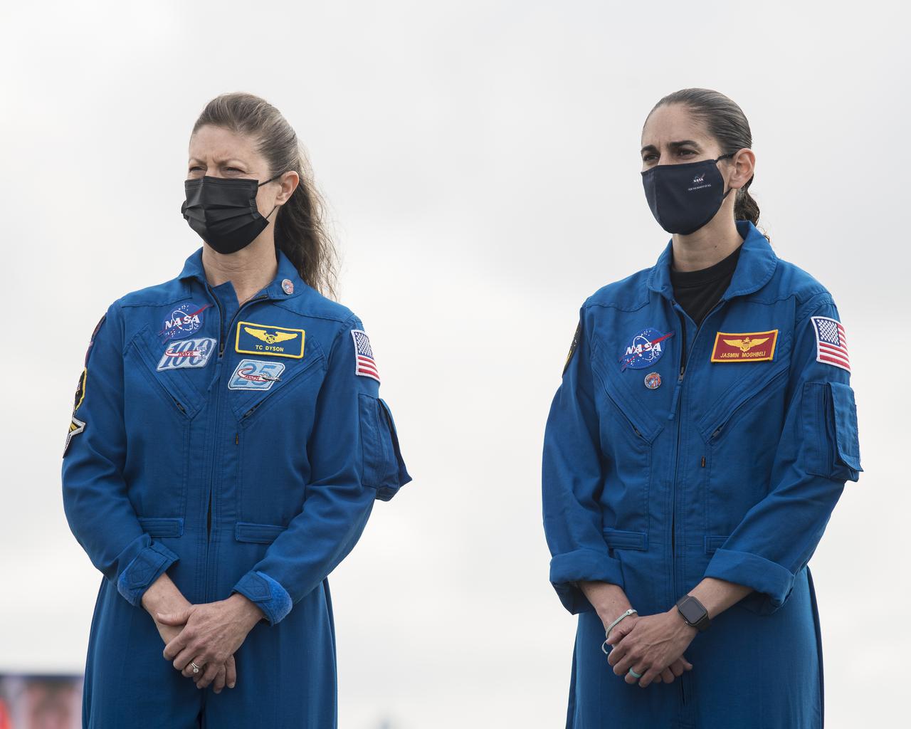 NASA astronauts Tracy Caldwell Dyson, left, and Jasmin Moghbeli are seen during a press conference ahead of the Crew-2 launch, Wednesday, April 21, 2021, at NASA’s Kennedy Space Center in Florida. NASA’s SpaceX Crew-2 mission is the second crew rotation mission of the SpaceX Crew Dragon spacecraft and Falcon 9 rocket to the International Space Station as part of the agency’s Commercial Crew Program. NASA astronauts Shane Kimbrough and Megan McArthur, ESA (European Space Agency) astronaut Thomas Pesquet, and Japan Aerospace Exploration Agency (JAXA) astronaut Akihiko Hoshide are scheduled to launch at 5:49 a.m. EDT on Friday, April 23, from Launch Complex 39A at the Kennedy Space Center. Photo Credit: (NASA/Aubrey Gemignani)