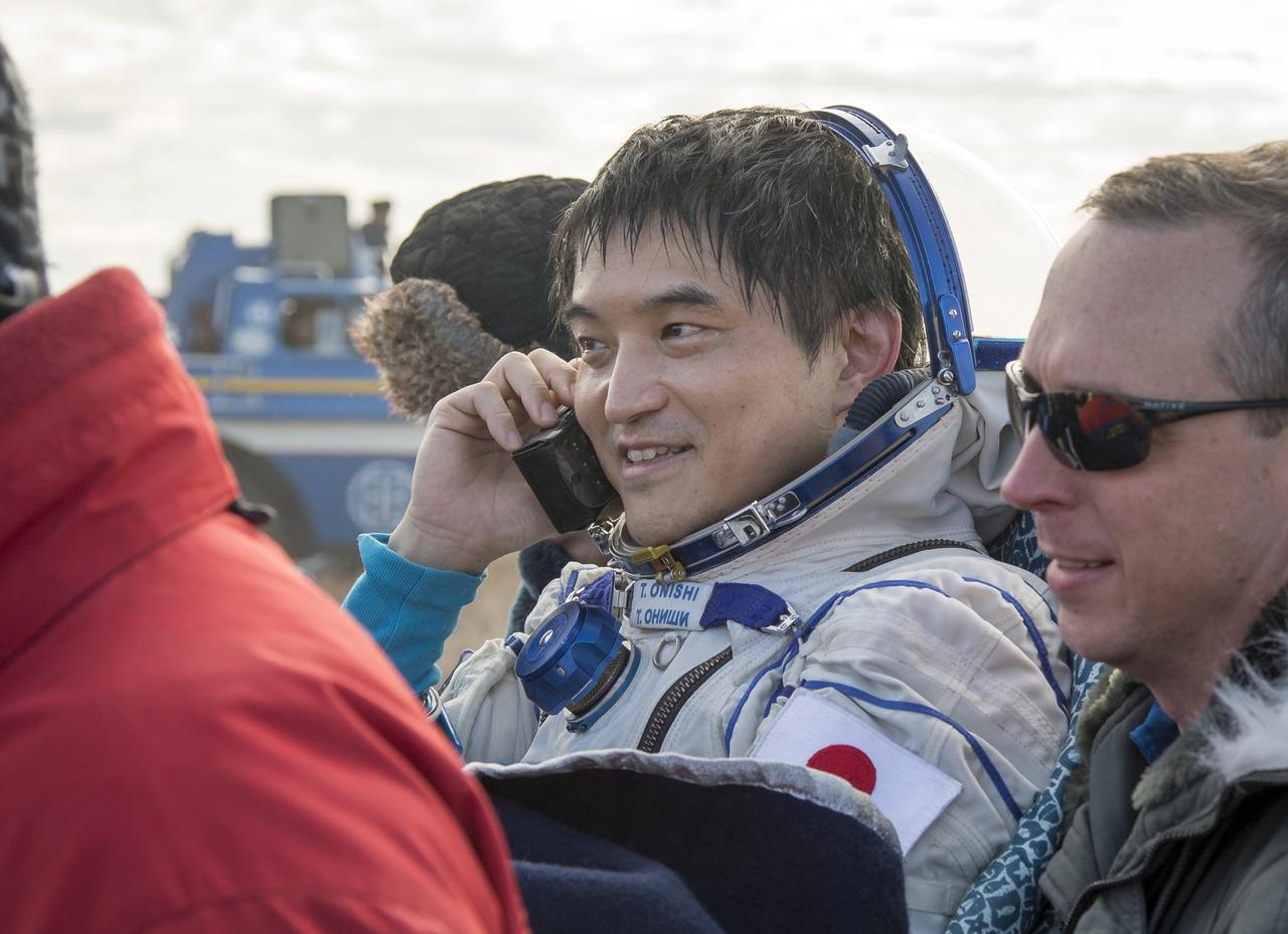 Expedition 49 astronaut Takuya Onishi of the Japan Aerospace Exploration Agency (JAXA) is carried into a medical tent shortly after he, Russian cosmonaut Anatoly Ivanishin of Roscosmos, and NASA astronaut Kate Rubins landed in a remote area near the town of Zhezkazgan, Kazakhstan on Sunday, Oct. 30, 2016  (Kazakh time). Rubins, Ivanishin, and Onishi are returning after 115 days in space where they served as members of the Expedition 48 and 49 crews onboard the International Space Station. Photo Credit: (NASA/Bill Ingalls)