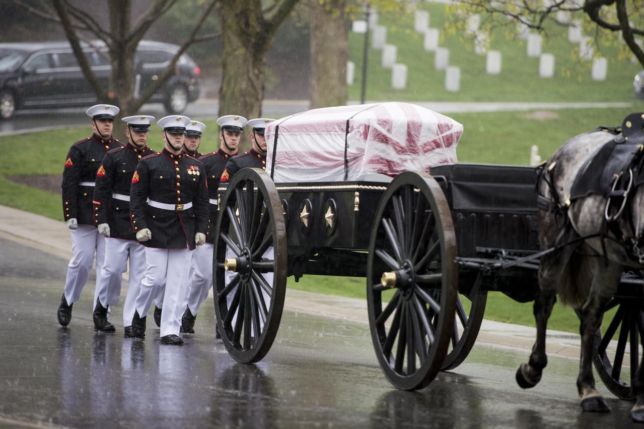 A horse drawn caisson carries former astronaut and U.S. Senator John Glenn to his final resting place during the interment ceremony at Arlington National Cemetery on Thursday, April 6, 2017 in Virginia. Glenn was the first American to orbit Earth on Feb. 20, 1962, in a five-hour flight aboard the Friendship 7 spacecraft. In 1998, he broke another record by returning to space at the age of 77 on the Space Shuttle Discovery. Photo Credit: (NASA/Aubrey Gemignani)
