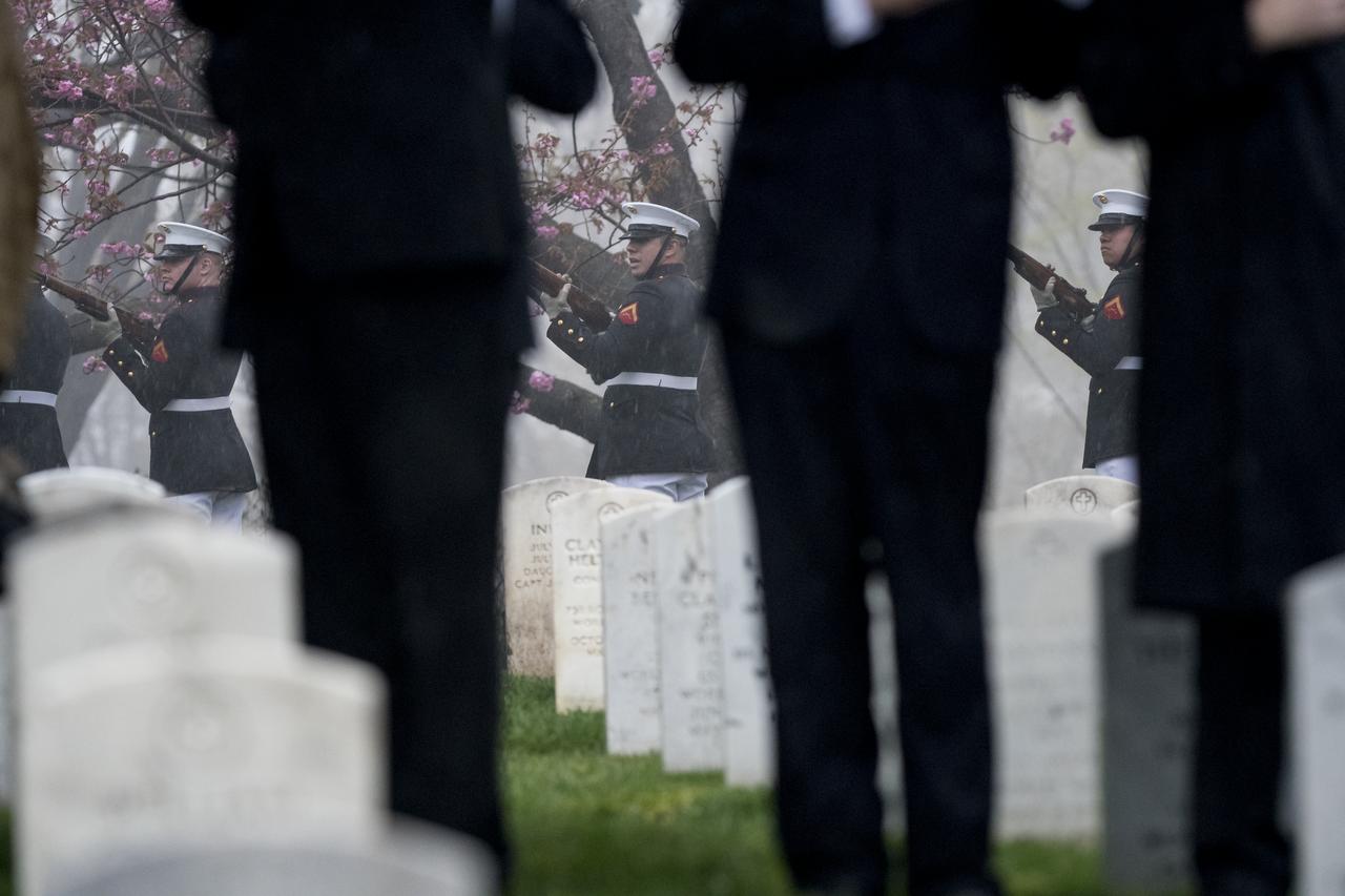 The traditional firing of three volleys each by seven service members is carried out to honor former astronaut and U.S. Senator John Glenn at his interment Thursday, April 6, 2017 at Arlington National Cemetery in Virginia. Glenn was the first American to orbit Earth on Feb. 20, 1962, in a five-hour flight aboard the Friendship 7 spacecraft. In 1998, he broke another record by returning to space at the age of 77 on the Space Shuttle Discovery. Photo Credit: (NASA/Aubrey Gemignani)