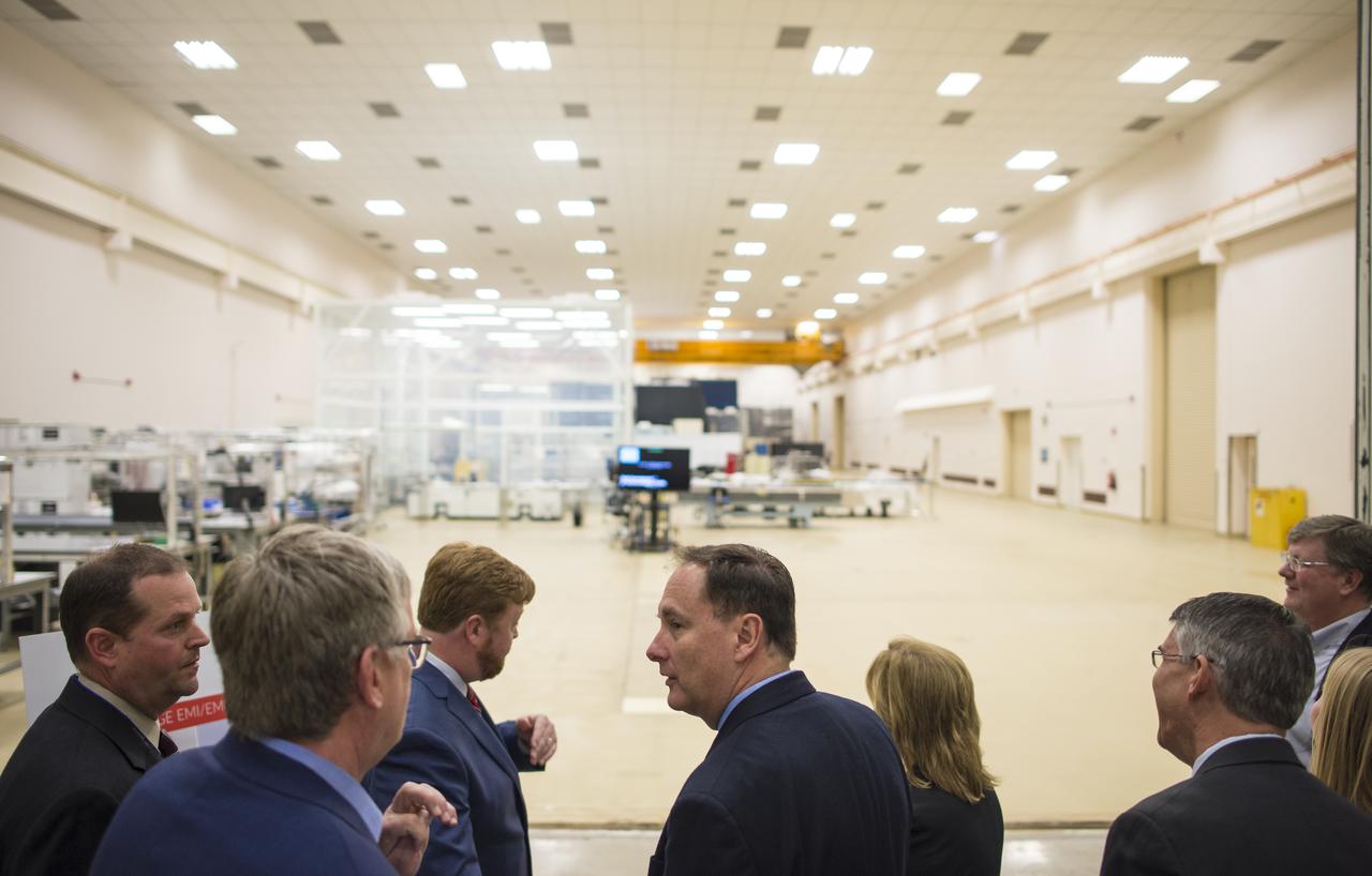 Acting NASA Administrator Robert Lightfoot, center, is seen during a visit to the environmental test facilities at Ball Aerospace, Thursday, April 6, 2017 in Boulder, Colo.  Photo Credit: (NASA/Joel Kowsky)