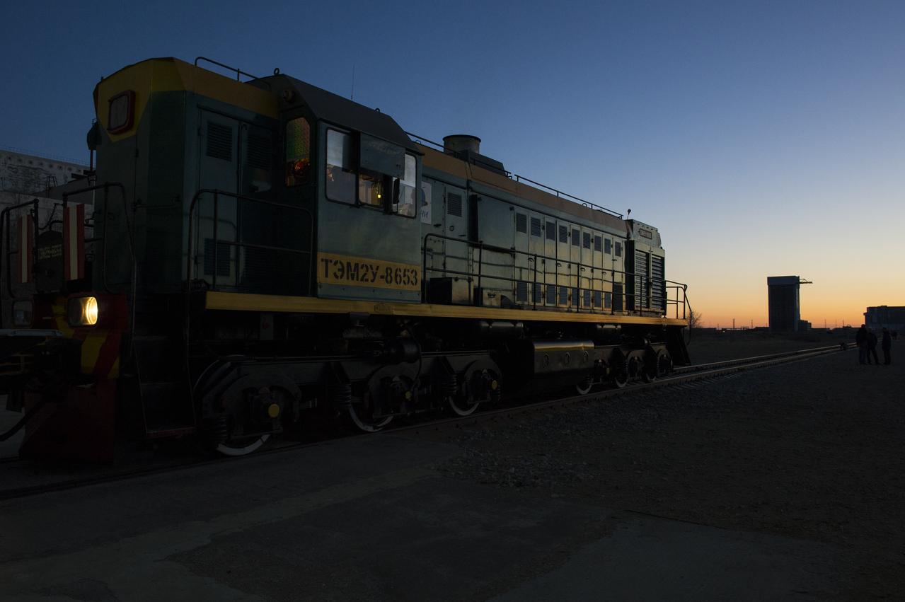 The train that will carry the Soyuz rocket to the launch pad is seen just before the door to the assembly building is opened on Monday, April 17, 2017 at the Baikonur Cosmodrome in Kazakhstan. The Soyuz MS-04 spacecraft, scheduled to launch April 20 Baikonur time, will carry Expedition 51 Soyuz Commander Fyodor Yurchikhin of Roscosmos and Flight Engineer Jack Fischer of NASA into orbit to begin their four and a half month mission on the International Space Station. Photo Credit: (NASA/Aubrey Gemignani)