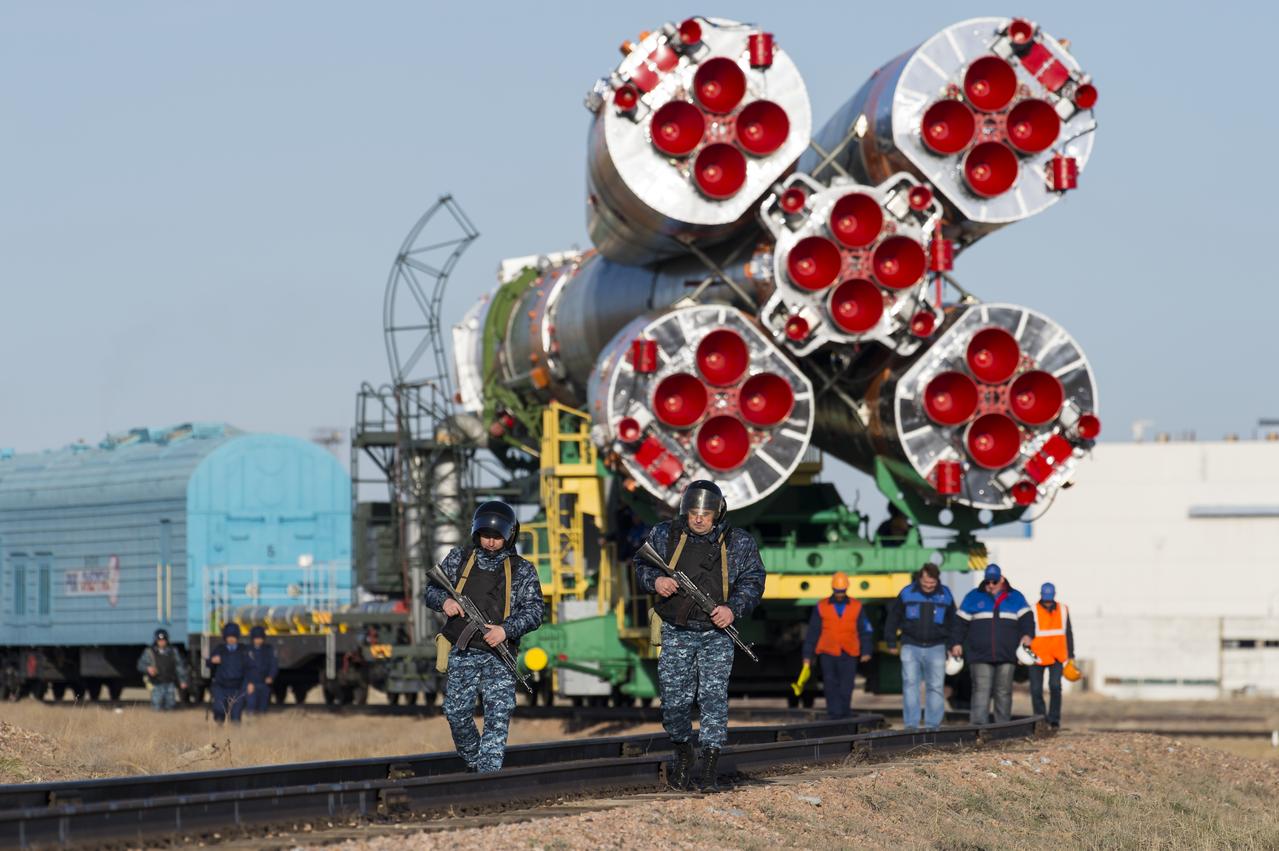 Russian security is seen as the Soyuz MS-04 spacecraft is rolled out to the launch pad by train on Monday, April 17, 2017 at the Baikonur Cosmodrome in Kazakhstan. Launch of the Soyuz rocket is scheduled for April 20 and will carry Expedition 51 Soyuz Commander Fyodor Yurchikhin of Roscosmos and Flight Engineer Jack Fischer of NASA into orbit to begin their four and a half month mission on the International Space Station.Photo Credit: (NASA/Aubrey Gemignani)