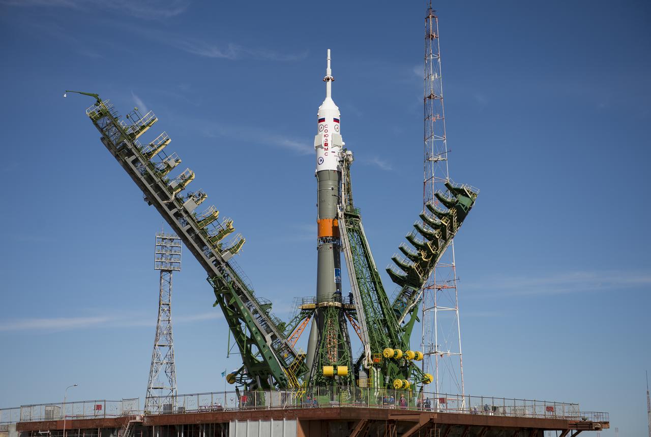 The gantry arms close around the Soyuz MS-04 spacecraft to secure the rocket at the launch pad on Monday, April 17, 2017 at the Baikonur Cosmodrome in Kazakhstan. Launch of the Soyuz rocket is scheduled for April 20 Baikonur time and will carry Expedition 51 Soyuz Commander Fyodor Yurchikhin of Roscosmos and Flight Engineer Jack Fischer of NASA into orbit to begin their four and a half month mission on the International Space Station. Photo Credit: (NASA/Aubrey Gemignani)