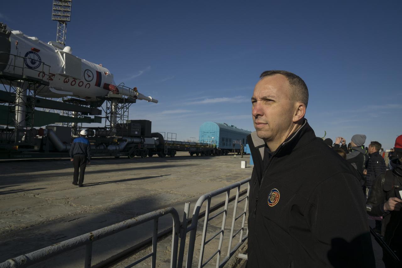 The Expedition 51 backup crew member, Randy Bresnik of NASA, watches as the Soyuz MS-04 spacecraft arrives at the launch pad by train on Monday, April 17, 2017 at the Baikonur Cosmodrome in Kazakhstan. Launch of the Soyuz rocket is scheduled for April 20 Baikonur time and will send Expedition 51 prime crew, Soyuz Commander Fyodor Yurchikhin of Roscosmos and Flight Engineer Jack Fischer of NASA on a four and a half month mission aboard the International Space Station. Photo Credit: (NASA/Aubrey Gemignani)