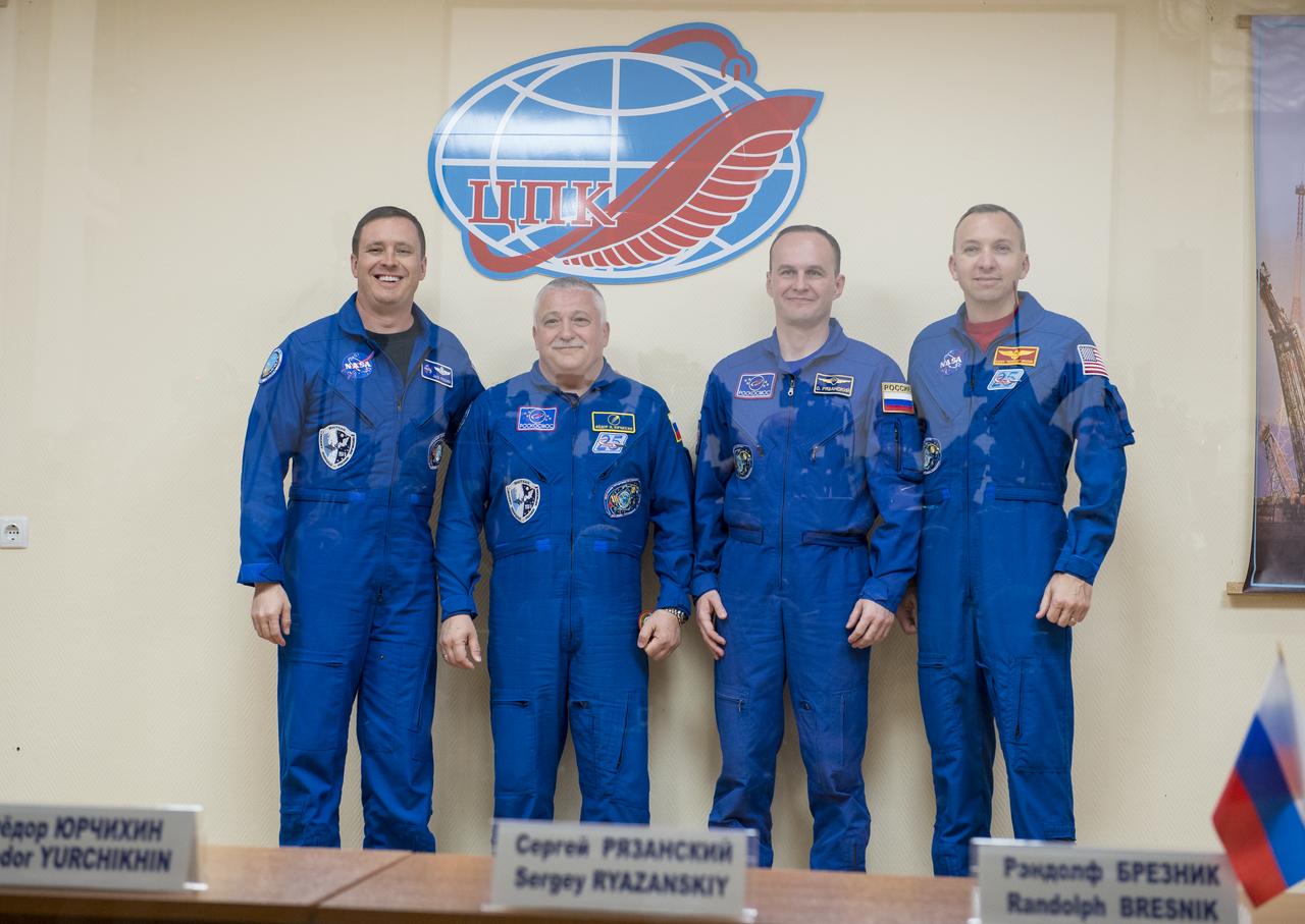 Expedition 51 prime crew members, Flight Engineer Jack Fischer of NASA, left, and Soyuz Commander Fyodor Yurchikhin of Roscosmos, second from left, pose for a photo with Expedition 51 back up crew members, Soyuz Commander Sergey Ryazanskiy of Roscosmos, second from right, and Flight Engineer Randy Bresnik of NASA, right, at the conclusion of the press conference held at the Cosmonaut Hotel in Baikonur, Kazakhstan on Wednesday, April 19, 2017. The mission is set to launch April 20 from the Baikonur Cosmodrome. Photo Credit: (NASA/Aubrey Gemignani)