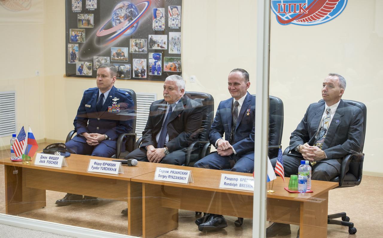 Expedition 51 prime crew members, Flight Engineer Jack Fischer of NASA, left, and Soyuz Commander Fyodor Yurchikhin of Roscosmos, second left, are seen with Expedition 51 back up crew members, Soyuz Commander Sergey Ryazanskiy of Roscosmos, second from right, and Flight Engineer Randy Bresnik of NASA, right at the State Commission meeting to approve the Soyuz launch of Expedition 51 to the International Space Station in Baikonur, Kazakhstan on Wednesday, April 19, 2017. The mission is set to launch April 20 from the Baikonur Cosmodrome. Photo Credit: (NASA/Aubrey Gemignani)