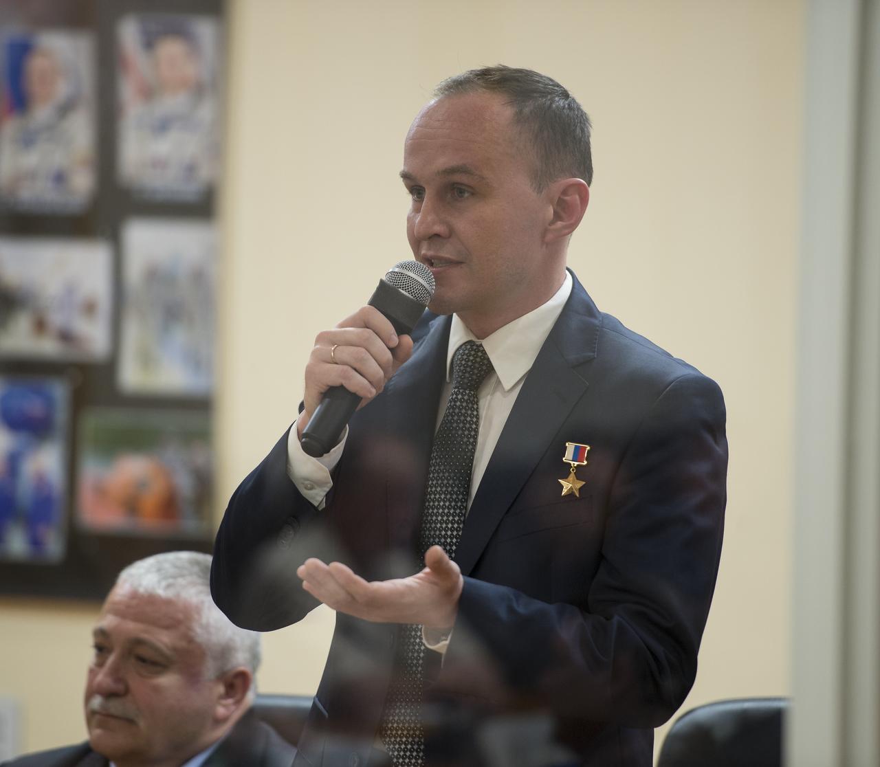 Expedition 51 backup crew member Sergey Ryazanskiy of Roscosmos speaks during the State Commission meeting to approve the Soyuz launch of Expedition 51 to the International Space Station, Wednesday, April 19, 2017 at the Cosmonaut Hotel in Baikonur, Kazakhstan.  The mission is set to launch April 20 from the Baikonur Cosmodrome.  Photo Credit: (NASA/Aubrey Gemignani)