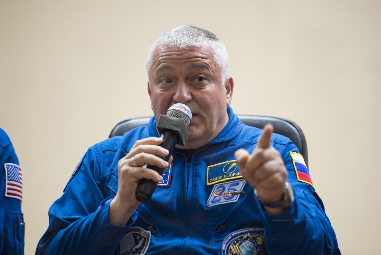 Expedition 51 Soyuz Commander Fyodor Yurchikhin of Roscosmos answers a question during a pre-launch press conference on Wednesday, April 19, 2017 at the Cosmonaut Hotel in Baikonur, Kazakhstan. Launch of the Soyuz rocket is scheduled for April 20 and will carry Yurchikhin and Flight Engineer Jack Fischer of NASA into orbit to begin their four and a half month mission on the International Space Station. Photo Credit: (NASA/Aubrey Gemignani).