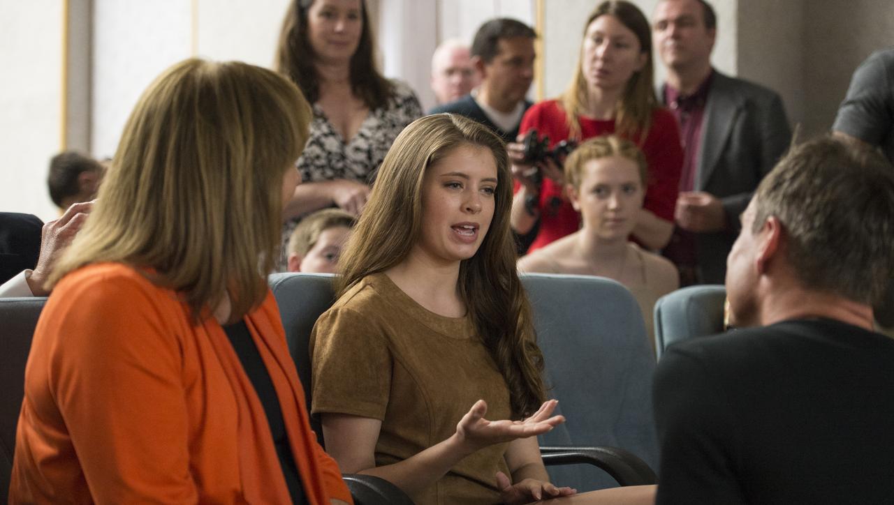 Expedition 51 Flight Engineer Jack Fischer's daughter Sariah Fischer is interviewed by media at the conclusion of a pre-launch press conference on Wednesday, April 19, 2017 at the Cosmonaut Hotel in Baikonur, Kazakhstan. Launch of the Soyuz rocket is scheduled for April 20 and will carry Fischer and Expedition 51 Soyuz Commander Fyodor Yurchikhin of Roscosmos into orbit to begin their four and a half month mission on the International Space Station. Photo Credit: (NASA/Aubrey Gemignani)