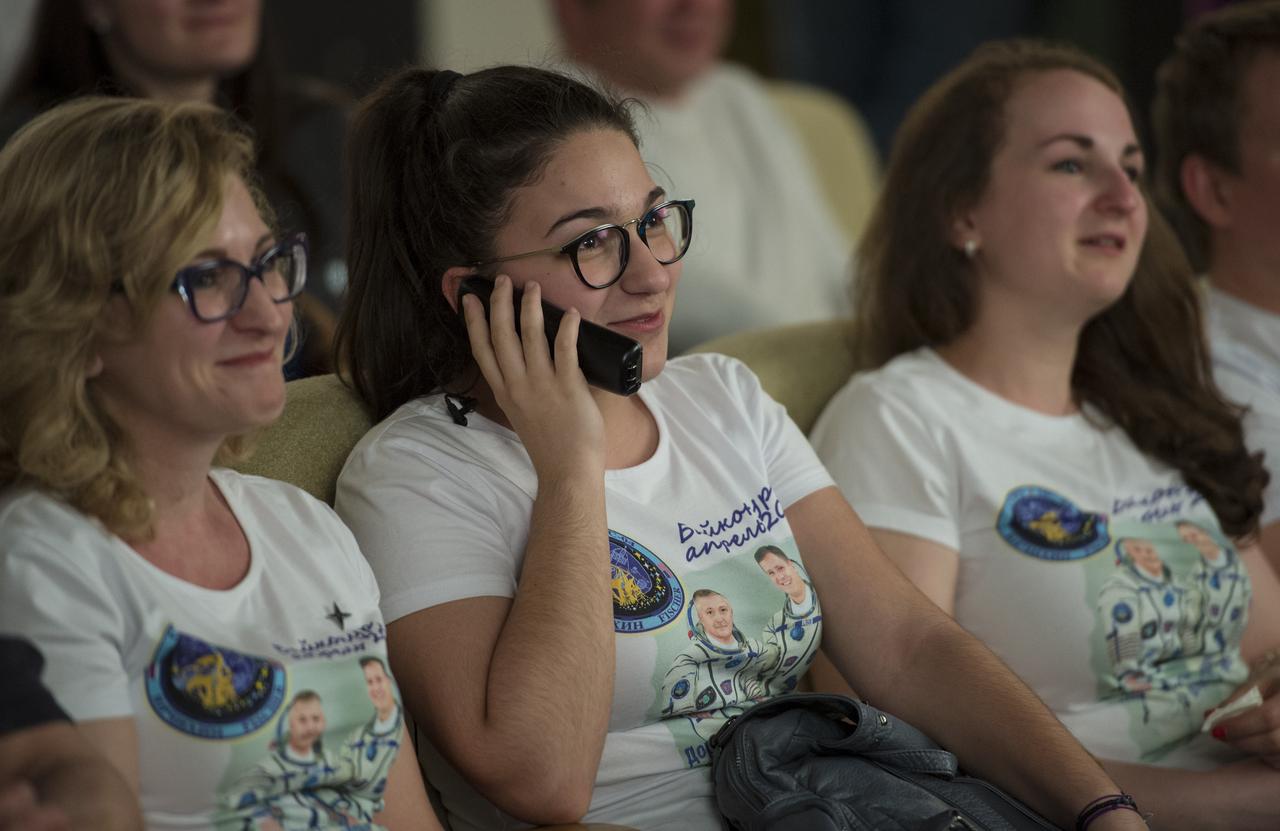 Family of Expedition 51 Soyuz Commander Fyodor Yurchikhin of Roscosmos speak to him by phone a few hours after his Soyuz MS-04 spacecraft docked to the International Space Station (ISS) on Thursday, April 20, 2017 at Tsenki Conference Hall in Baikonur, Kazakhstan. Flight engineer Jack Fischer of NASA and Yurchikhin's arrival to the ISS comes the same day they launched from the Baikonur Cosmodrome in Kazakhstan. Photo Credit (NASA/Aubrey Gemignani)