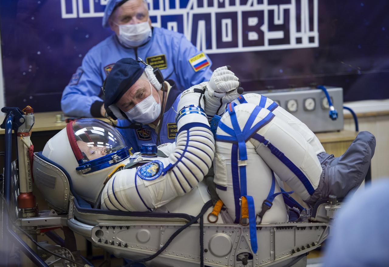 Expedition 51 Flight Engineer Jack Fischer of NASA has his Russian Sokol suit pressure checked in preparation for his launch aboard the Soyuz MS-04 spacecraft on Thursday, April 20, 2017 at the Baikonur Cosmodrome in Kazakhstan. Launch of the Soyuz rocket is scheduled for 1:13pm April 20 Baikonur time, and will carry Fischer and fellow crewmate, Soyuz Commander Fyodor Yurchikhin of Roscosmos into orbit to begin their four and a half month mission on the International Space Station. Photo Credit: (NASA/Aubrey Gemignani)