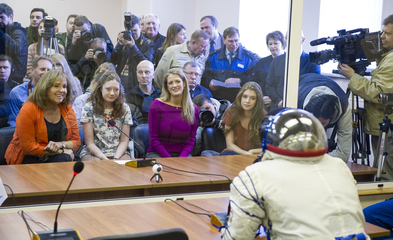 Expedition 51 Flight Engineer Jack Fischer of NASA speaks with his family after having his Russian Sokol suit pressure checked in preparation for launch onboard the Soyuz MS-04 spacecraft on Thursday, April 20, 2017 at the Baikonur Cosmodrome in Kazakhstan. The Soyuz spacecraft with Fischer and Soyuz Commander Fyodor Yurchikhin of Roscosmos is scheduled to launch at 1:13 p.m. Baikonur time on April 20. Photo Credit: (GCTC/Andrey Shelepin)