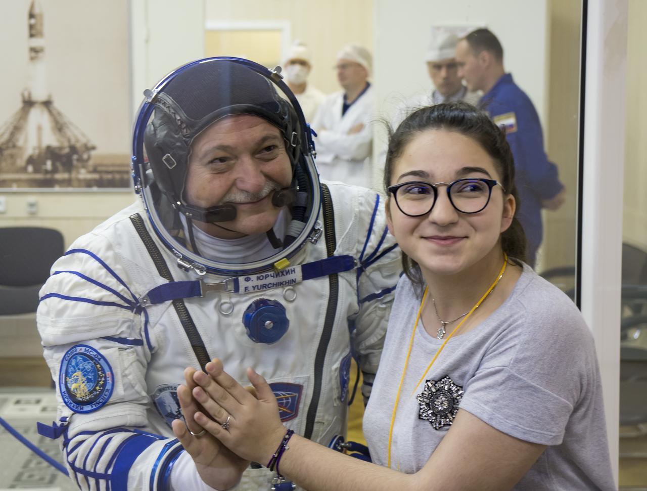 Expedition 51 Soyuz Commander Fyodor Yurchikhin of Roscosmos poses for a photo with his daughter after having his Russian Sokol suit pressure checked in preparation for launch onboard the Soyuz MS-04 spacecraft on Thursday, April 20, 2017 at the Baikonur Cosmodrome in Kazakhstan. The Soyuz spacecraft with Yurchikhin and Flight Engineer Jack Fischer of NASA is scheduled to launch at 1:13 p.m. Baikonur time on April 20. Photo Credit: (NASA/Victor Zelentsov)