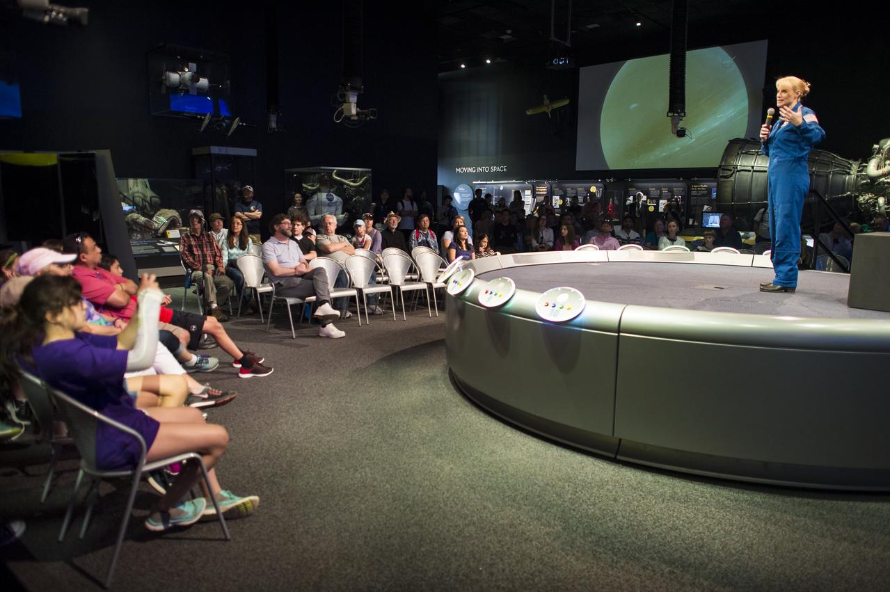 NASA Astronaut Kate Rubins speaks about her time onboard the International Space Station during Expeditions 48 and 49 Thursday, April 27, 2017 at Smithsonian's National Air and Space Museum in Washington. Rubins became the first person to sequence DNA in space and completed her first mission when she landed in a remote area near the town of Zhezkazgan, Kazakhstan in October 2016. Photo Credit: (NASA/Aubrey Gemignani)