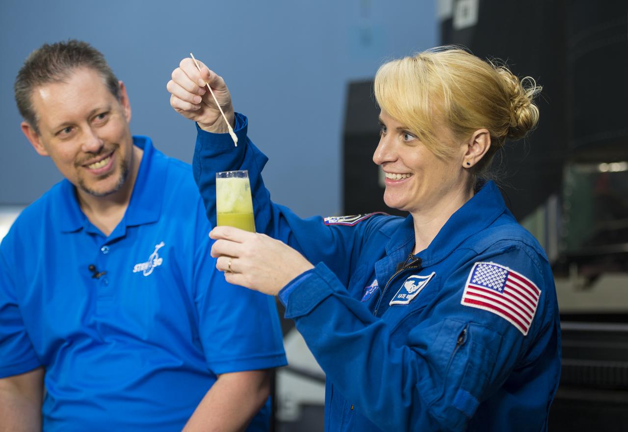 NASA Astronaut Kate Rubins conducts a DNA experiment for a STEM in 30 segment, Thursday, April 27, 2017 at Smithsonian's National Air and Space Museum in Washington. Rubins served on the International Space Station during Expeditions 48 and 49 and became the first person to sequence DNA in space. She completed her first mission when she landed in a remote area near the town of Zhezkazgan, Kazakhstan in October 2016. Photo Credit: (NASA/Aubrey Gemignani)