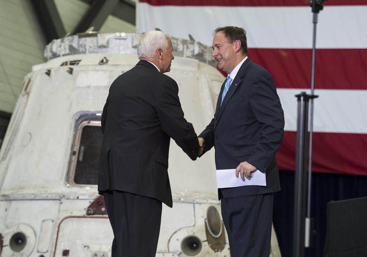 Vice President Mike Pence shakes hands with Acting NASA Administrator Robert Lightfoot before addressing NASA employees, Thursday, July 6, 2017, at the Vehicle Assembly Building at NASA’s Kennedy Space Center (KSC) in Cape Canaveral, Florida. The Vice President thanked employees for advancing American leadership in space, before going on a tour of the center that highlighted the public-private partnerships at KSC, as both NASA and commercial companies prepare to launch American astronauts from the multi-user spaceport. Photo Credit: (NASA/Aubrey Gemignani)