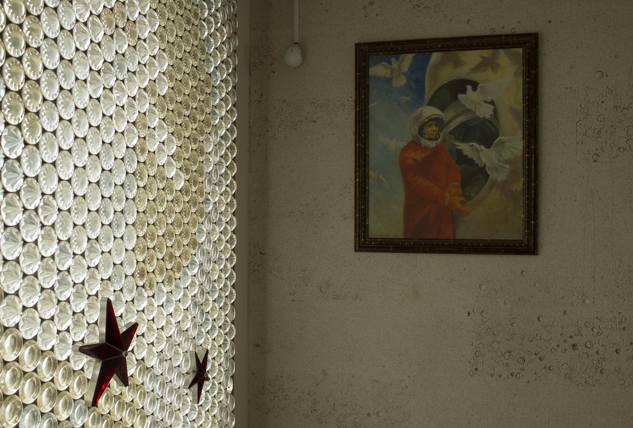 A painting of Yuri Gagarin is seen in the lobby of the building where the Expedition 52 prime and backup crews held a crew press conference on the grounds of the Gagarin Cosmonaut Training Center (GCTC), Monday, July 10, 2017 in Star City, Russia. Photo Credit: (NASA/Bill Ingalls)