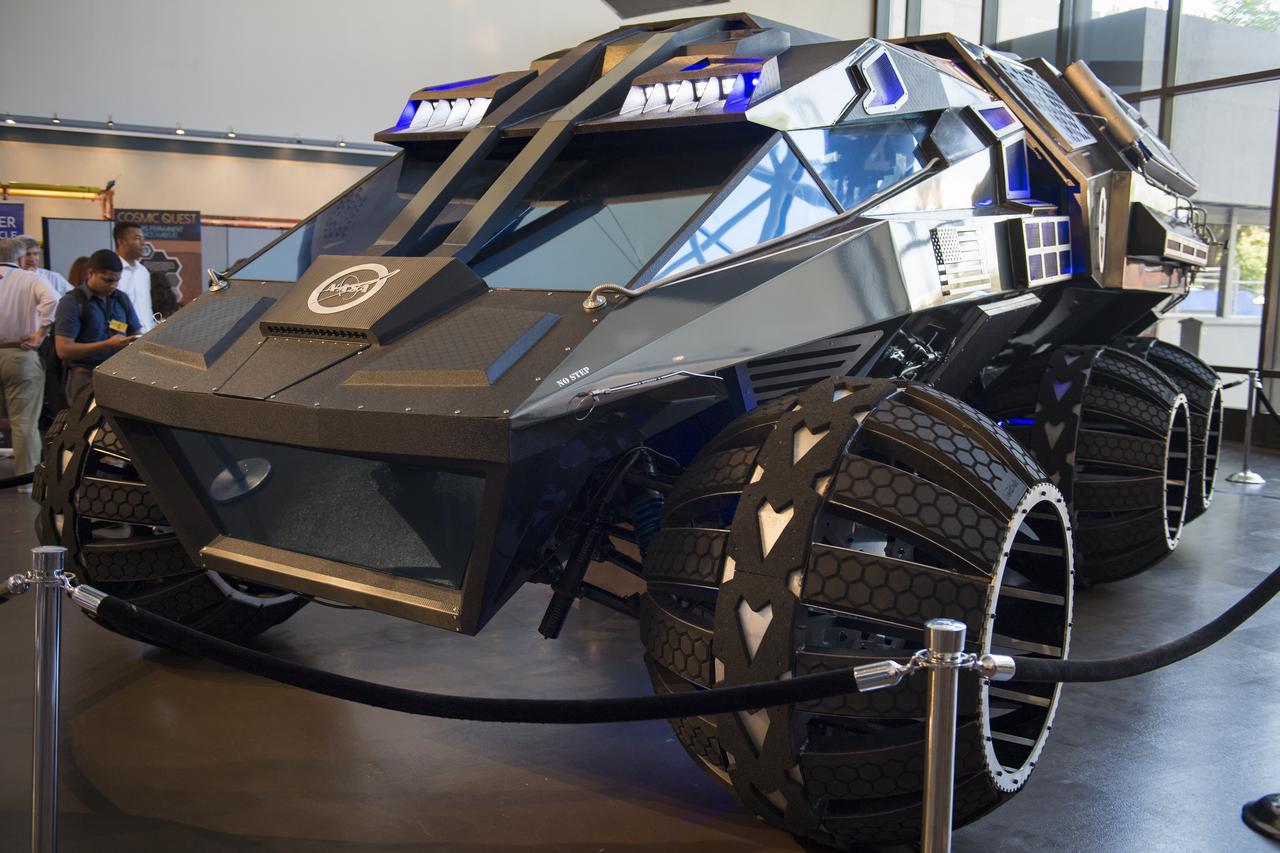 A view of the Mars rover concept, developed by vehicle designers, the Parker Brothers, with advice from NASA, is seen here during the Smithsonian Institution’s National Air and Space Museum’s Mars Day, an annual event celebrating the Red Planet with exhibits, speakers, and educational activities, Friday, July 21, 2017 in Washington. The Mars rover concept is currently on an East Coast tour from its home base at the Kennedy Space Center Visitor’s Center in Florida, and is designed to engage and educate the public by demonstrating the types of features and equipment a future human exploration vehicle may need. Photo Credit: (NASA/Aubrey Gemignani)
