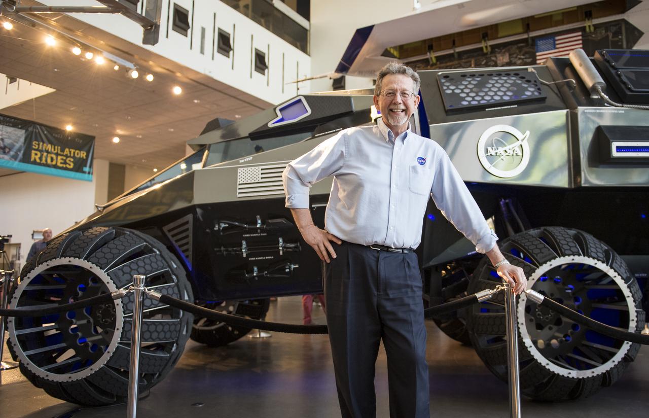 Jim Green, director of NASA’s Planetary Science Division, poses for a photo with the Mars rover concept, developed by vehicle designers, the Parker Brothers, with advice from NASA, during the Smithsonian Institution’s National Air and Space Museum’s Mars Day, Friday, July 21, 2017 in Washington. The Mars rover concept is currently on an East Coast tour from its home base at the Kennedy Space Center Visitor’s Center in Florida, and is designed to engage and educate the public by demonstrating the types of features and equipment a future human exploration vehicle may need. Photo Credit: (NASA/Aubrey Gemignani)