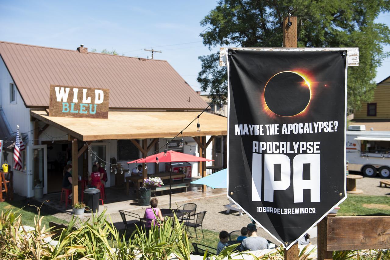 A sign is seen along the roads in Madras, Oregon, where thousands of visitors are expected for the total solar eclipse, Saturday, August 19, 2017. The eclipse will be sweeping across a narrow portion of the contiguous United States from Lincoln Beach, Oregon to Charleston, South Carolina on August 21. A partial solar eclipse will be visible across the entire North American continent along with parts of South America, Africa, and Europe.  Photo Credit: (NASA/Aubrey Gemignani)