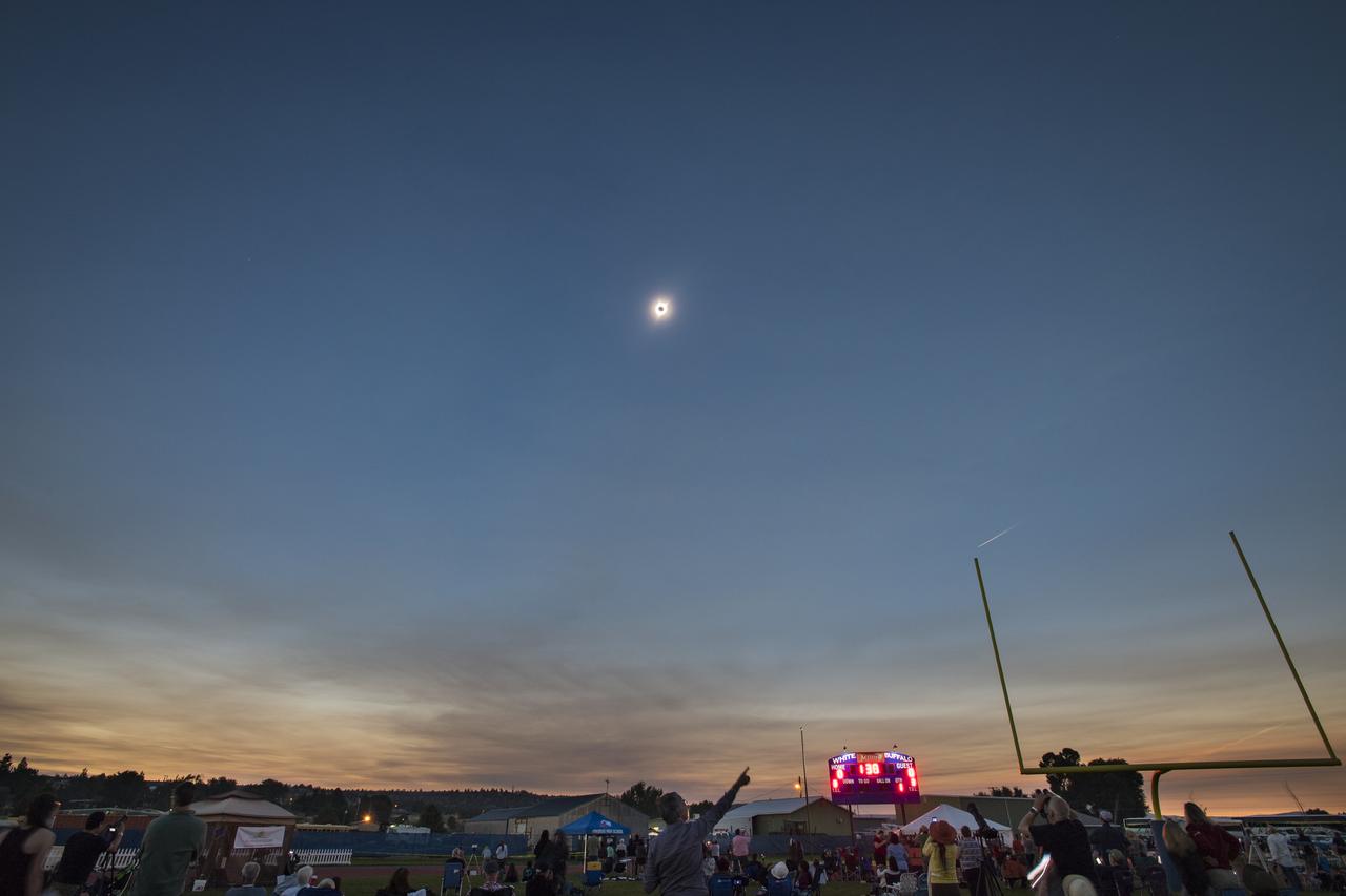 A total solar eclipse is seen on Monday, August 21, 2017 above Madras, Oregon. A total solar eclipse swept across a narrow portion of the contiguous United States from Lincoln Beach, Oregon to Charleston, South Carolina. A partial solar eclipse was visible across the entire North American continent along with parts of South America, Africa, and Europe.  Photo Credit: (NASA/Aubrey Gemignani)
