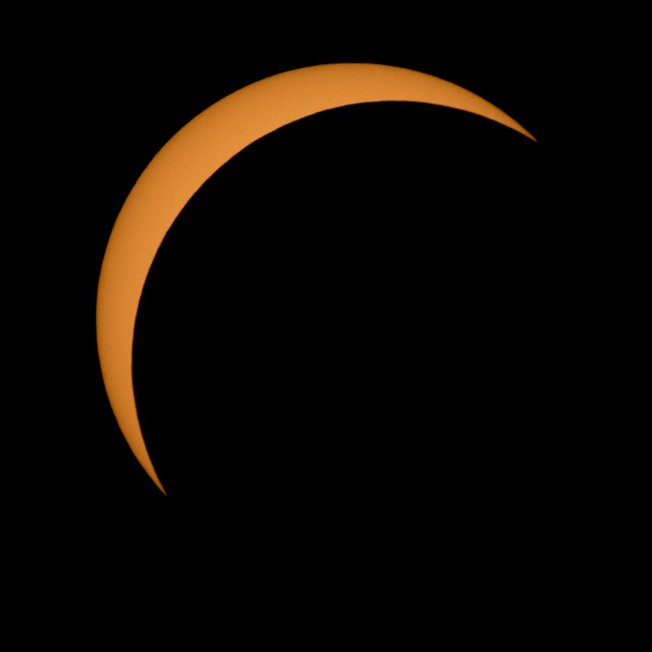 The Moon is seen passing in front of the Sun during a solar eclipse from Ross Lake, Northern Cascades National Park, Washington on Monday, Aug. 21, 2017. A total solar eclipse swept across a narrow portion of the contiguous United States from Lincoln Beach, Oregon to Charleston, South Carolina. A partial solar eclipse was visible across the entire North American continent along with parts of South America, Africa, and Europe.  Photo Credit: (NASA/Bill Ingalls)