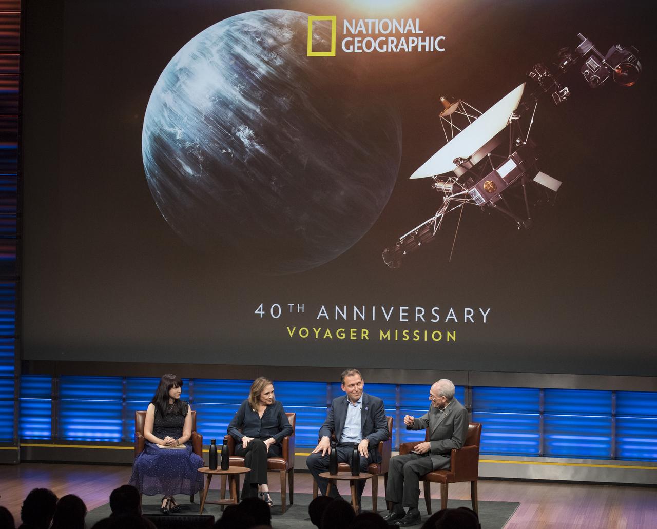 Victoria Jaggard, National Geographic Magazine science editor, left, moderates a panel discussion with, Ann Druyan, writer/producer and golden record visionary, second from left; Thomas Zurbuchen, associate administrator for NASA's Science Mission Directorate, second from right; and Ed Stone, Voyager project scientist, right, at an event to celebrate the 40th Anniversary of the launch of the Voyager 1 and 2 missions, Tuesday, September 5, 2017 at National Geographic Society Headquarters in Washington. Voyager 1 was launched September 5, 1977, with a mission to study Jupiter and Saturn, but now the twin Voyager spacecrafts are on a journey into interstellar space to search for the heliopause, a region never reached by any other spacecraft. Photo Credit: (NASA/Aubrey Gemignani)
