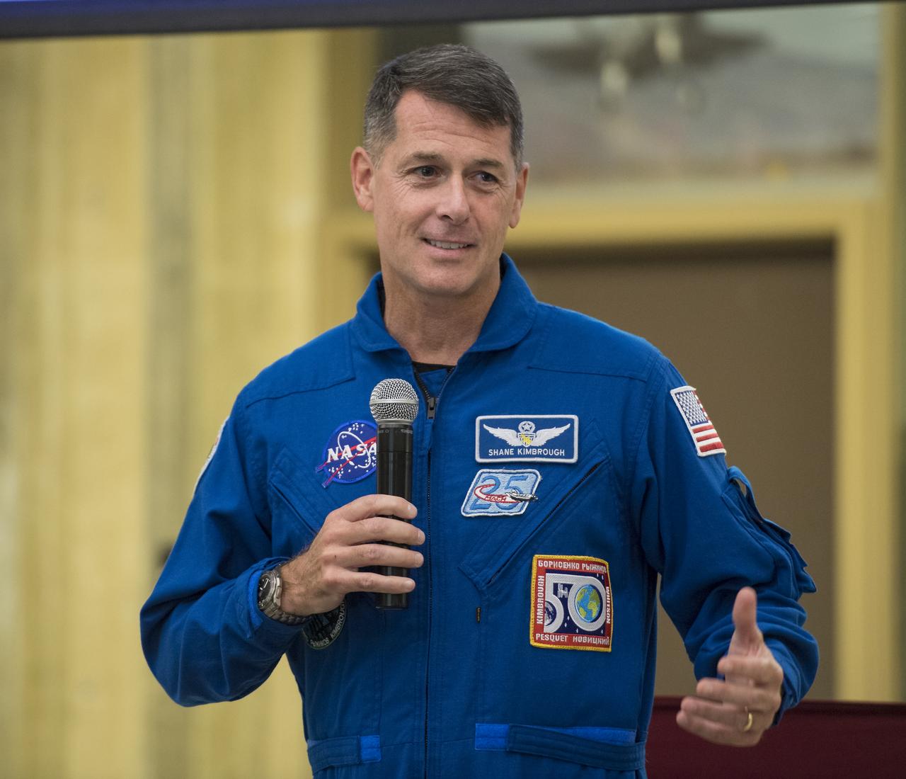 NASA astronaut Shane Kimbrough speaks about his time onboard the International Space Station (ISS) during Expeditions 49/50, Tuesday, September 12, 2017 at Arlington Career Center in Arlington, Virginia. During Expedition 50, Kimbrough completed four spacewalks for a total of 39 hours outside the ISS, and concluded his 173-day mission when he landed in a remote area near the town of Zhezkazgan, Kazakhstan in April 2017. Photo Credit: (NASA/Aubrey Gemignani)