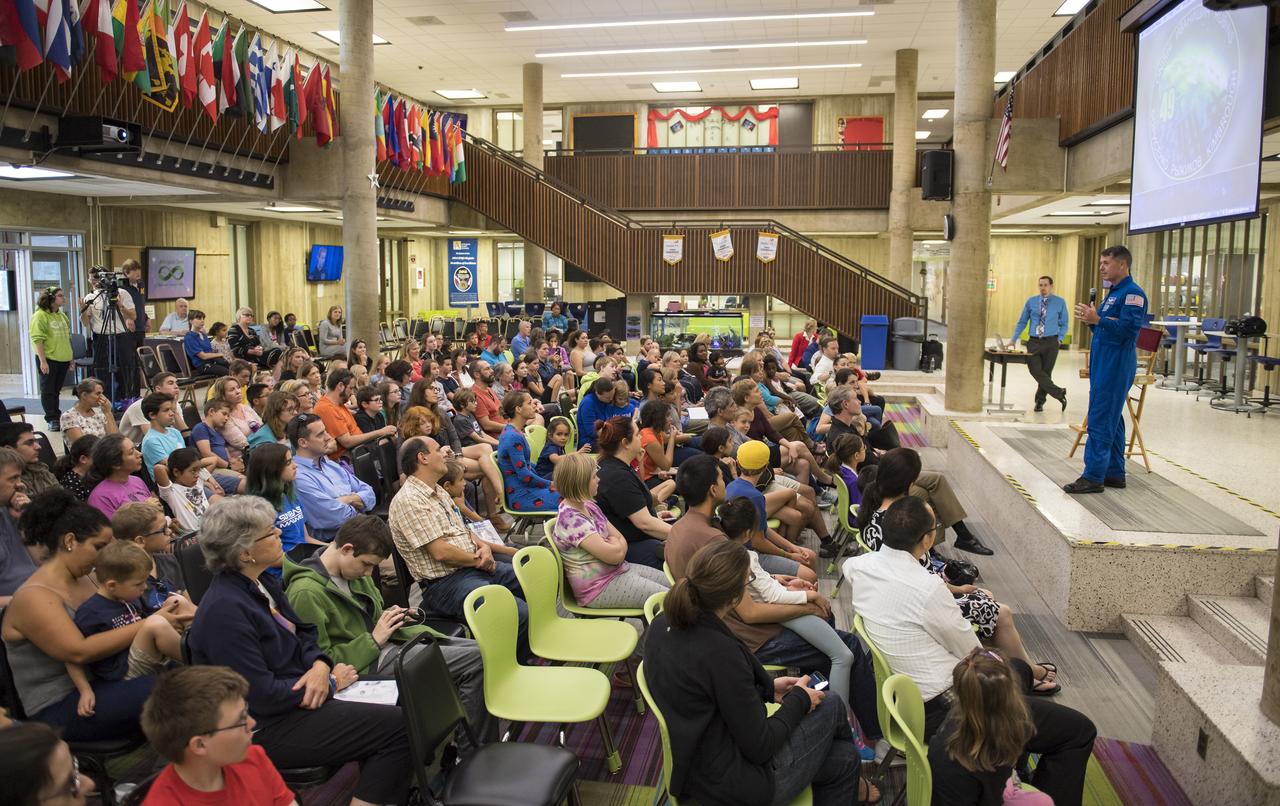 NASA astronaut Shane Kimbrough speaks about his time onboard the International Space Station (ISS) during Expeditions 49/50, Tuesday, September 12, 2017 at Arlington Career Center in Arlington, Virginia. During Expedition 50, Kimbrough completed four spacewalks for a total of 39 hours outside the ISS, and concluded his 173-day mission when he landed in a remote area near the town of Zhezkazgan, Kazakhstan in April 2017. Photo Credit: (NASA/Aubrey Gemignani)