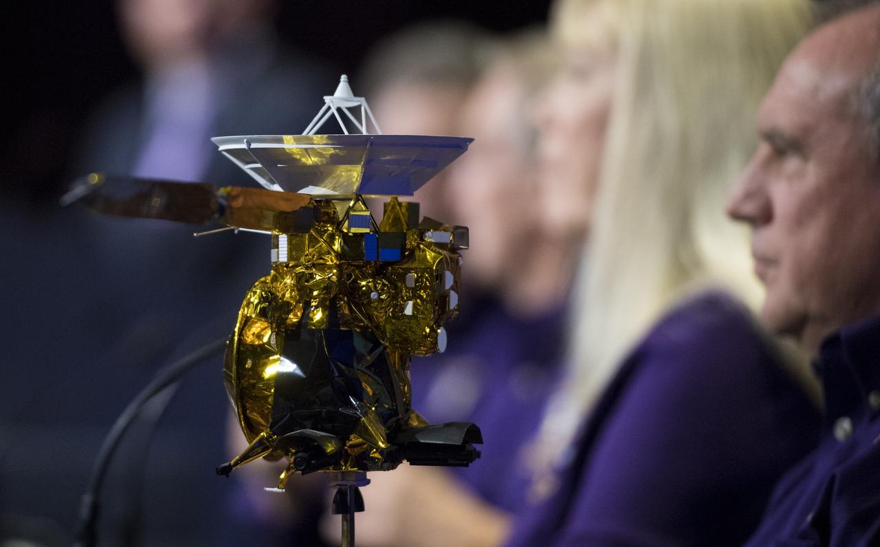 A model of the Cassini-Huygens spacecraft is seen during a press conference previewing Cassini's End of Mission, Wednesday, Sept. 13, 2017 at NASA's Jet Propulsion Laboratory in Pasadena, California. Since its arrival in 2004, the Cassini-Huygens mission has been a discovery machine, revolutionizing our knowledge of the Saturn system and captivating us with data and images never before obtained with such detail and clarity. On Sept. 15, 2017, operators will deliberately plunge the spacecraft into Saturn, as Cassini gathered science until the end. The “plunge” ensures Saturn’s moons will remain pristine for future exploration. During Cassini’s final days, mission team members from all around the world gathered at NASA’s Jet Propulsion Laboratory, Pasadena, California, to celebrate the achievements of this historic mission. Photo Credit: (NASA/Joel Kowsky)