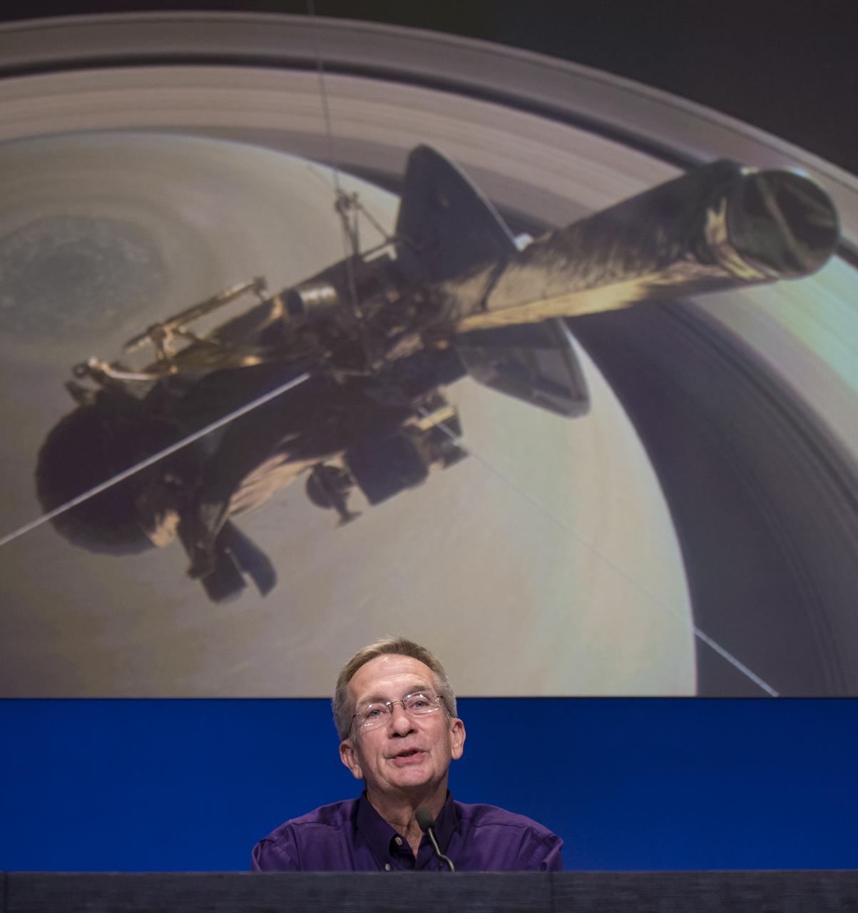 Cassini program manager at JPL, Earl Maize speaks during a press conference previewing Cassini's End of Mission, Wednesday, Sept. 13, 2017 at NASA's Jet Propulsion Laboratory in Pasadena, California. Since its arrival in 2004, the Cassini-Huygens mission has been a discovery machine, revolutionizing our knowledge of the Saturn system and captivating us with data and images never before obtained with such detail and clarity. On Sept. 15, 2017, operators will deliberately plunge the spacecraft into Saturn, as Cassini gathered science until the end. The “plunge” ensures Saturn’s moons will remain pristine for future exploration. During Cassini’s final days, mission team members from all around the world gathered at NASA’s Jet Propulsion Laboratory, Pasadena, California, to celebrate the achievements of this historic mission. Photo Credit: (NASA/Joel Kowsky)