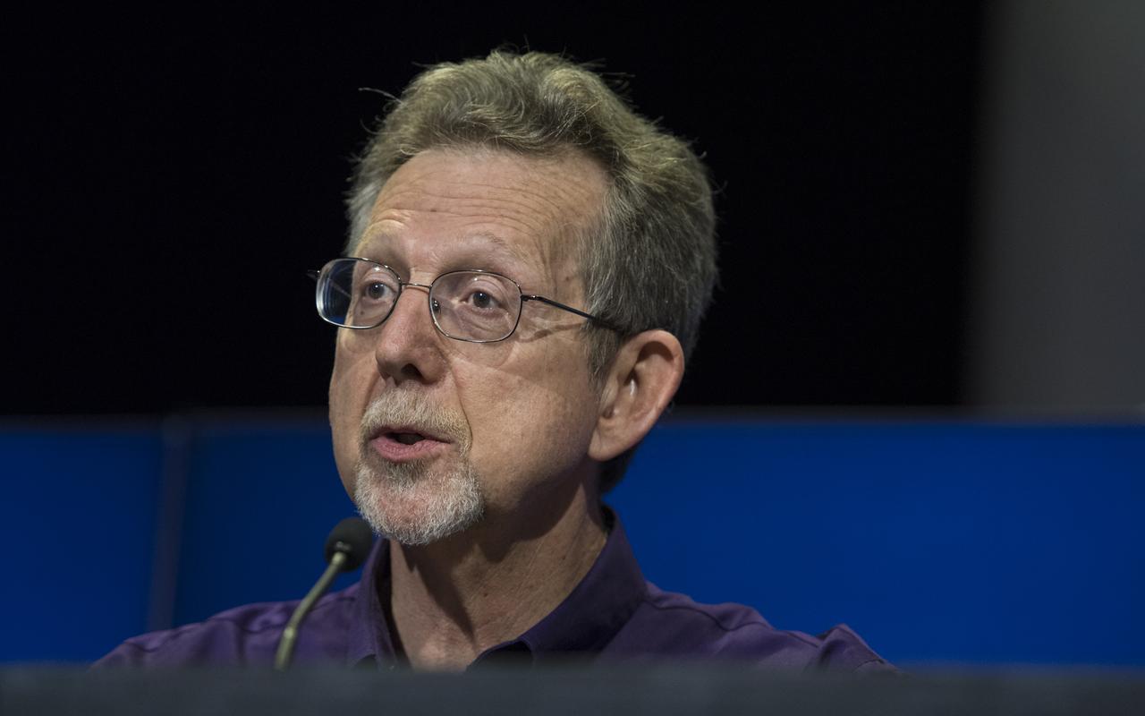 director of NASA's Planetary Science Division, Jim Green answers questions a press conference previewing Cassini's End of Mission, Wednesday, Sept. 13, 2017 at NASA's Jet Propulsion Laboratory in Pasadena, California. Since its arrival in 2004, the Cassini-Huygens mission has been a discovery machine, revolutionizing our knowledge of the Saturn system and captivating us with data and images never before obtained with such detail and clarity. On Sept. 15, 2017, operators will deliberately plunge the spacecraft into Saturn, as Cassini gathered science until the end. The “plunge” ensures Saturn’s moons will remain pristine for future exploration. During Cassini’s final days, mission team members from all around the world gathered at NASA’s Jet Propulsion Laboratory, Pasadena, California, to celebrate the achievements of this historic mission. Photo Credit: (NASA/Joel Kowsky)