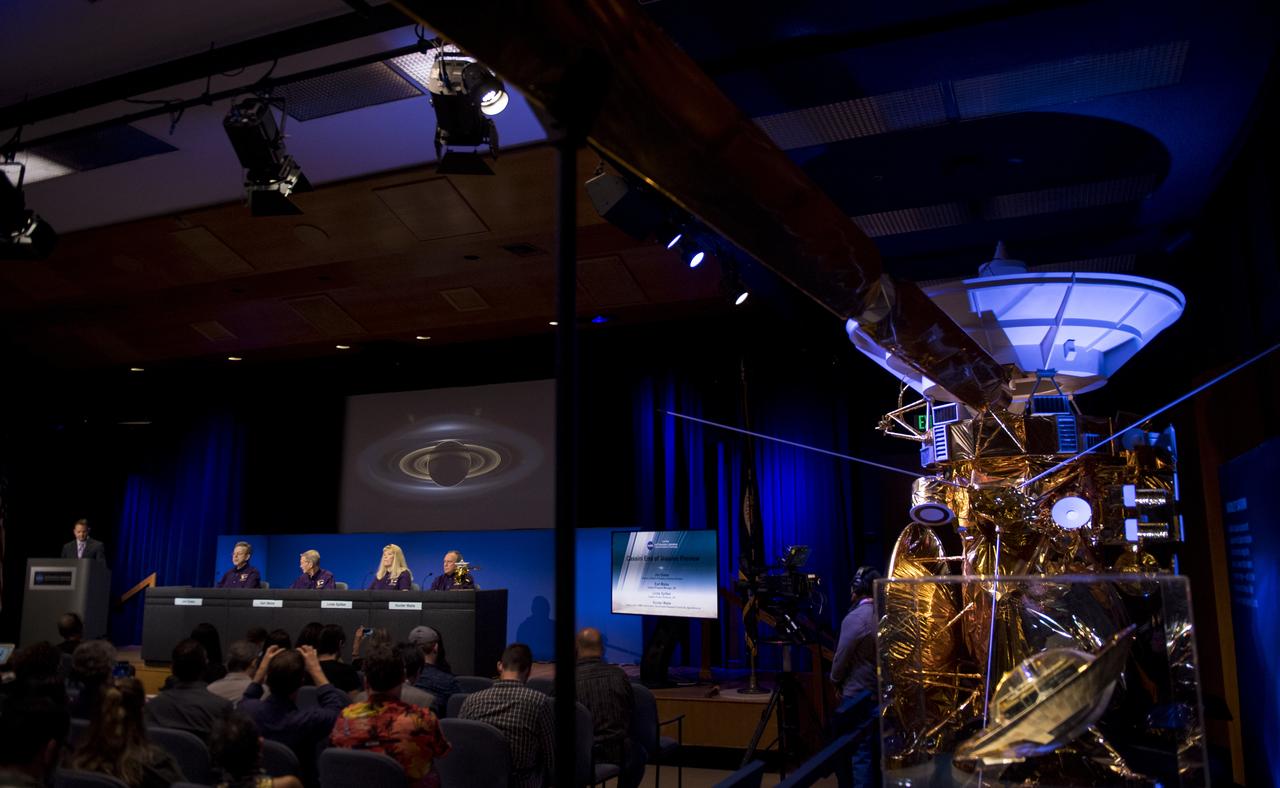 A model of the Cassini spacecraft is seen during a press conference previewing Cassini's End of Mission, Wednesday, Sept. 13, 2017 at NASA's Jet Propulsion Laboratory in Pasadena, California. Participants in the press conference were: Director of NASA's Planetary Science Division, Jim Green, left, Cassini program manager at JPL, Earl Maize, second from right, Cassini project scientist at JPL, Linda Spilker, second from right, and principle investigator for the Neutral Mass Spectrometer (INMS) at the Southwest Research Institute, Hunter Waite, right. Since its arrival in 2004, the Cassini-Huygens mission has been a discovery machine, revolutionizing our knowledge of the Saturn system and captivating us with data and images never before obtained with such detail and clarity. On Sept. 15, 2017, operators will deliberately plunge the spacecraft into Saturn, as Cassini gathered science until the end. The “plunge” ensures Saturn’s moons will remain pristine for future exploration. During Cassini’s final days, mission team members from all around the world gathered at NASA’s Jet Propulsion Laboratory, Pasadena, California, to celebrate the achievements of this historic mission. Photo Credit: (NASA/Joel Kowsky)