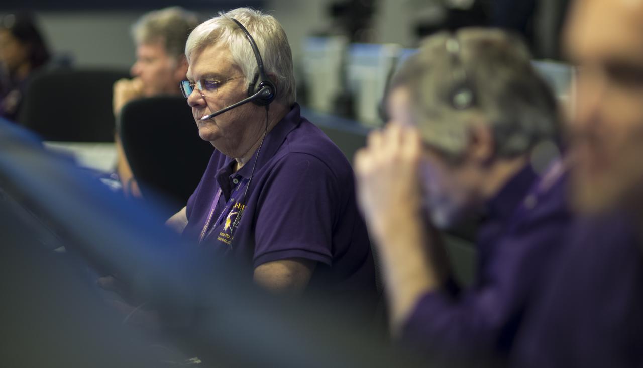 Spacecraft operations team manager for the Cassini mission at Saturn, Julie Webster, watches monitors in mission control of the Space Flight Operations Center as the Cassini spacecraft begins downlink data through NASA's Deep Space Network, Thursday, Sept. 14, 2017 at NASA's Jet Propulsion Laboratory in Pasadena, California. Since its arrival in 2004, the Cassini-Huygens mission has been a discovery machine, revolutionizing our knowledge of the Saturn system and captivating us with data and images never before obtained with such detail and clarity. On Sept. 15, 2017, operators will deliberately plunge the spacecraft into Saturn, as Cassini gathered science until the end. The “plunge” ensures Saturn’s moons will remain pristine for future exploration. During Cassini’s final days, mission team members from all around the world gathered at NASA’s Jet Propulsion Laboratory, Pasadena, California, to celebrate the achievements of this historic mission. Photo Credit: (NASA/Joel Kowsky)