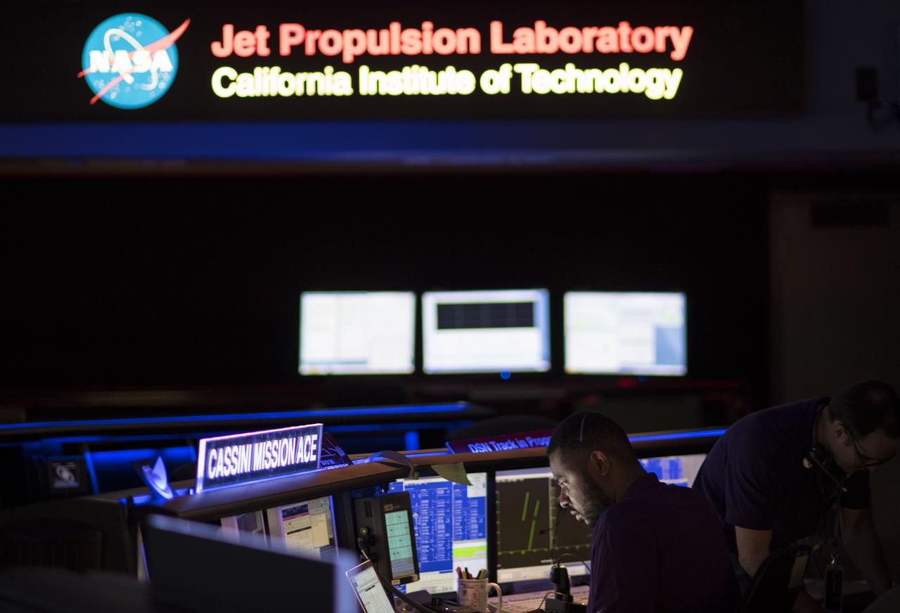 The Cassini Mission Ace console is seen inside the Space Flight Operations Center at NASA's Jet Propulsion Laboratory, Thursday, Sept. 14, 2017 in Pasadena, California. Since its arrival in 2004, the Cassini-Huygens mission has been a discovery machine, revolutionizing our knowledge of the Saturn system and captivating us with data and images never before obtained with such detail and clarity. On Sept. 15, 2017, operators will deliberately plunge the spacecraft into Saturn, as Cassini gathered science until the end. The “plunge” ensures Saturn’s moons will remain pristine for future exploration. During Cassini’s final days, mission team members from all around the world gathered at NASA’s Jet Propulsion Laboratory, Pasadena, California, to celebrate the achievements of this historic mission. Photo Credit: (NASA/Joel Kowsky)